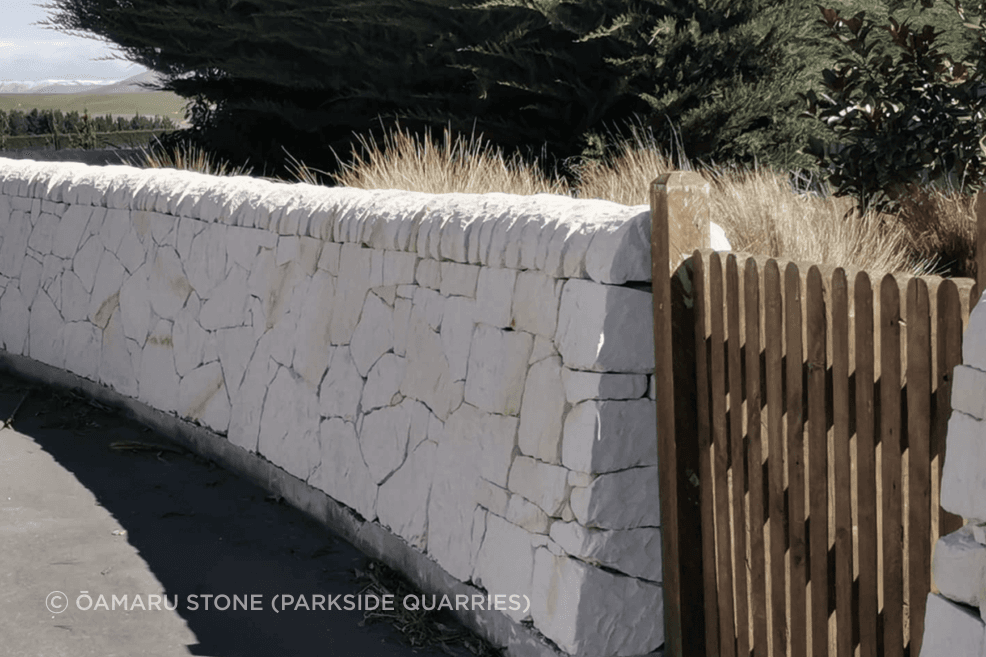 Limestone is often distinguished by its off-white colour, given to it by its calcite composition.