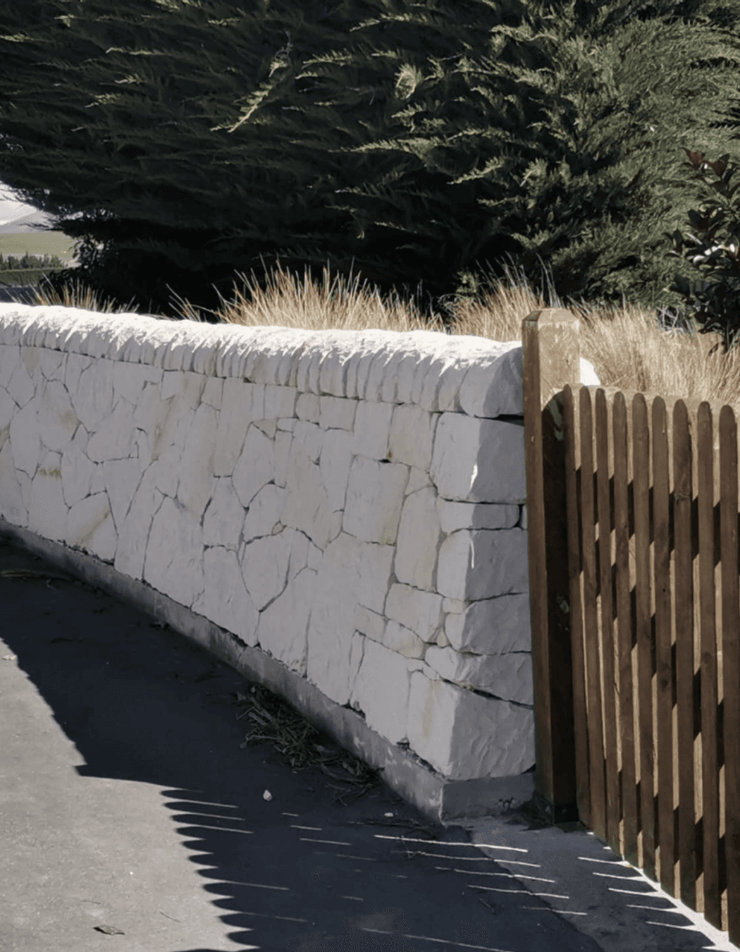 Limestone is often distinguished by its off-white colour, given to it by its calcite composition.