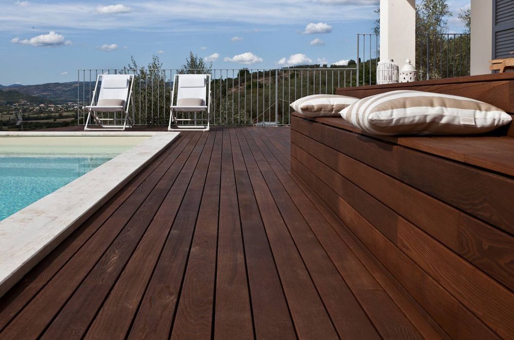 Built in seating, like this made from Listone Giordano Outdoor Decking by Space Furniture, offers seamless design aesthetics.