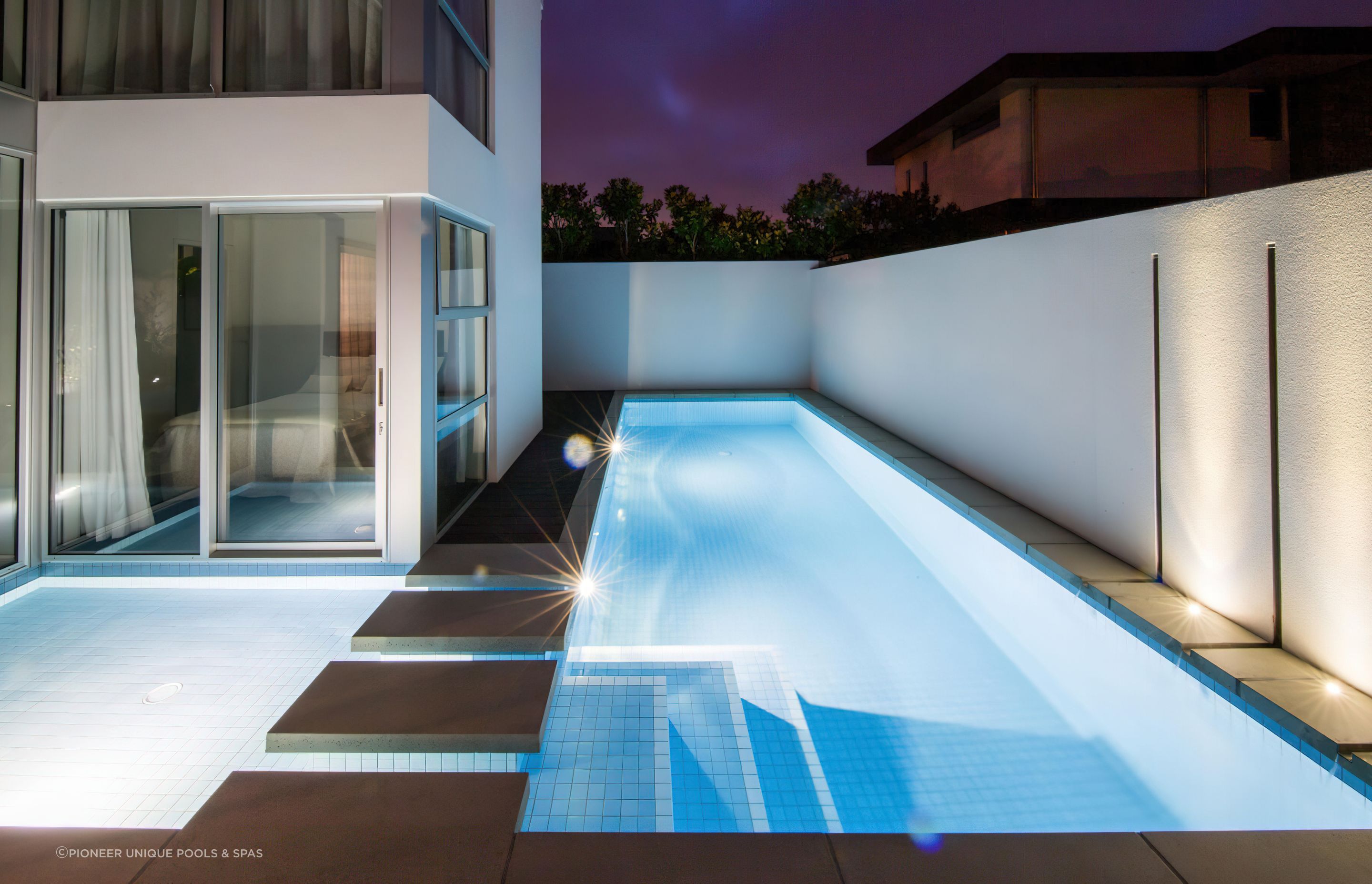 This shotcrete pool by Pioneer Unique Pools & Spas makes use of every inch of its tight suburban site.