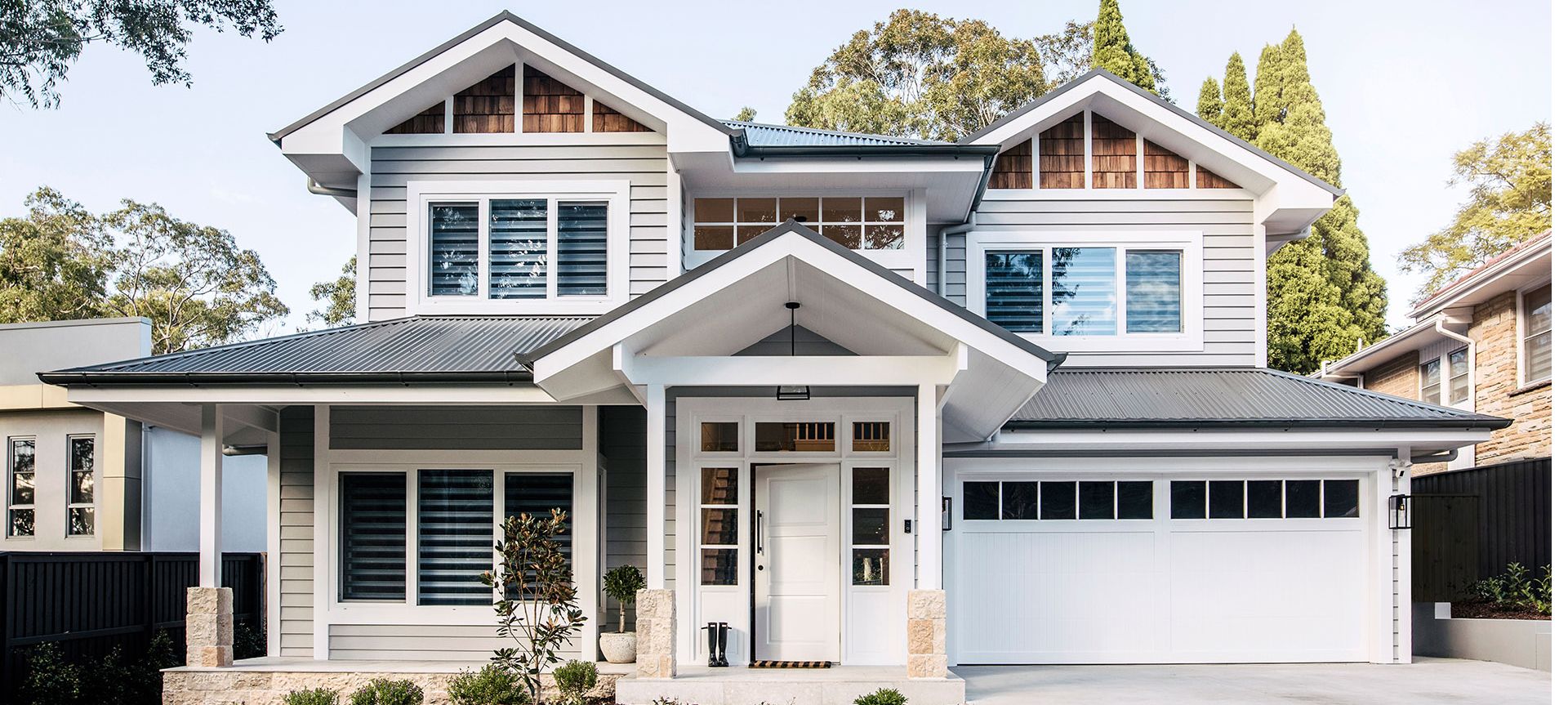 Custom home build construction of a contemporary, 2-storey, family-friendly home that embodies the timeless features of the classic Hampton’s style