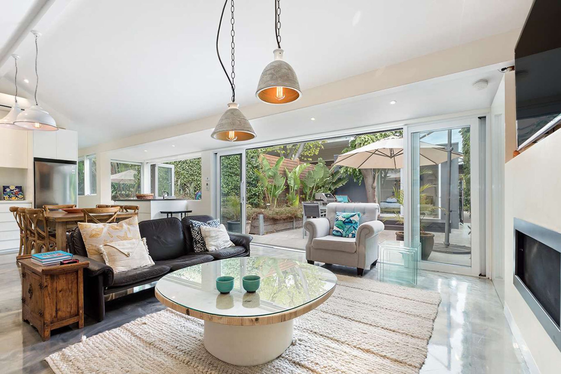 Pendant lights are popular in living rooms, such as in this Melbourne home