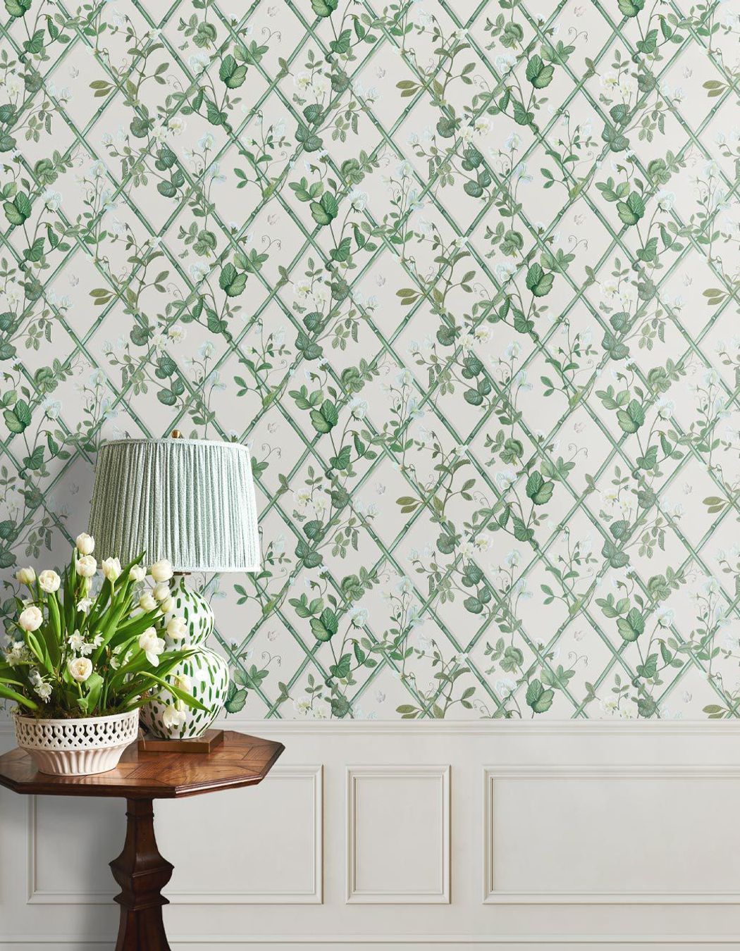 Green against a white backdrop brings freshness to a living room.