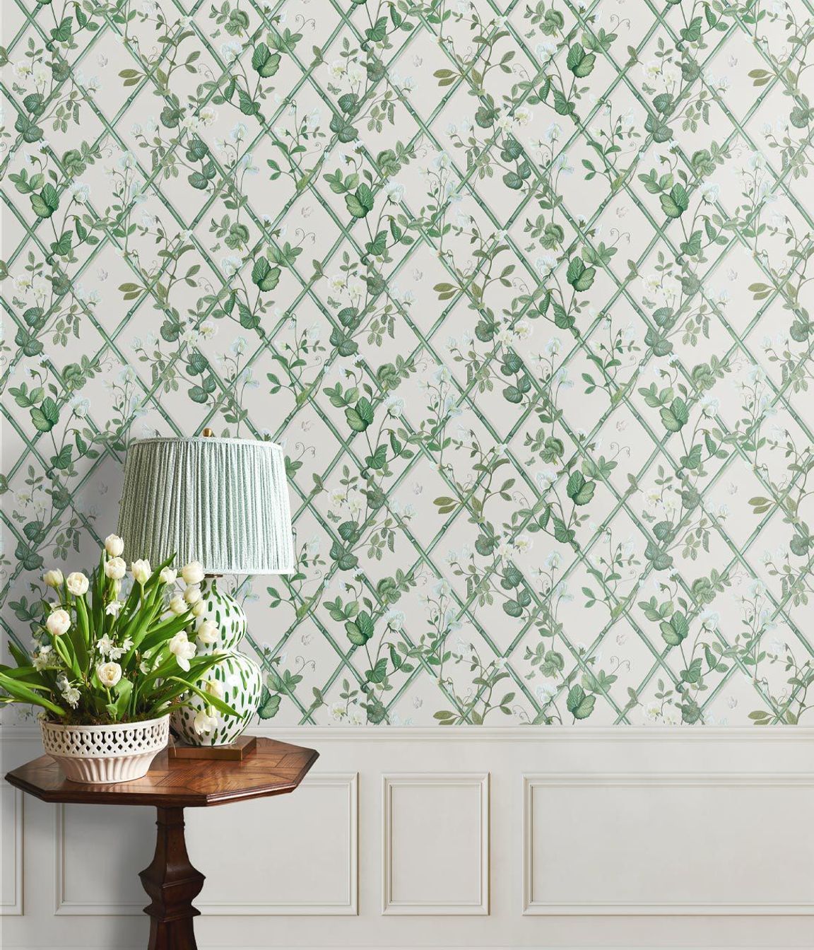 Green against a white backdrop brings freshness to a living room.