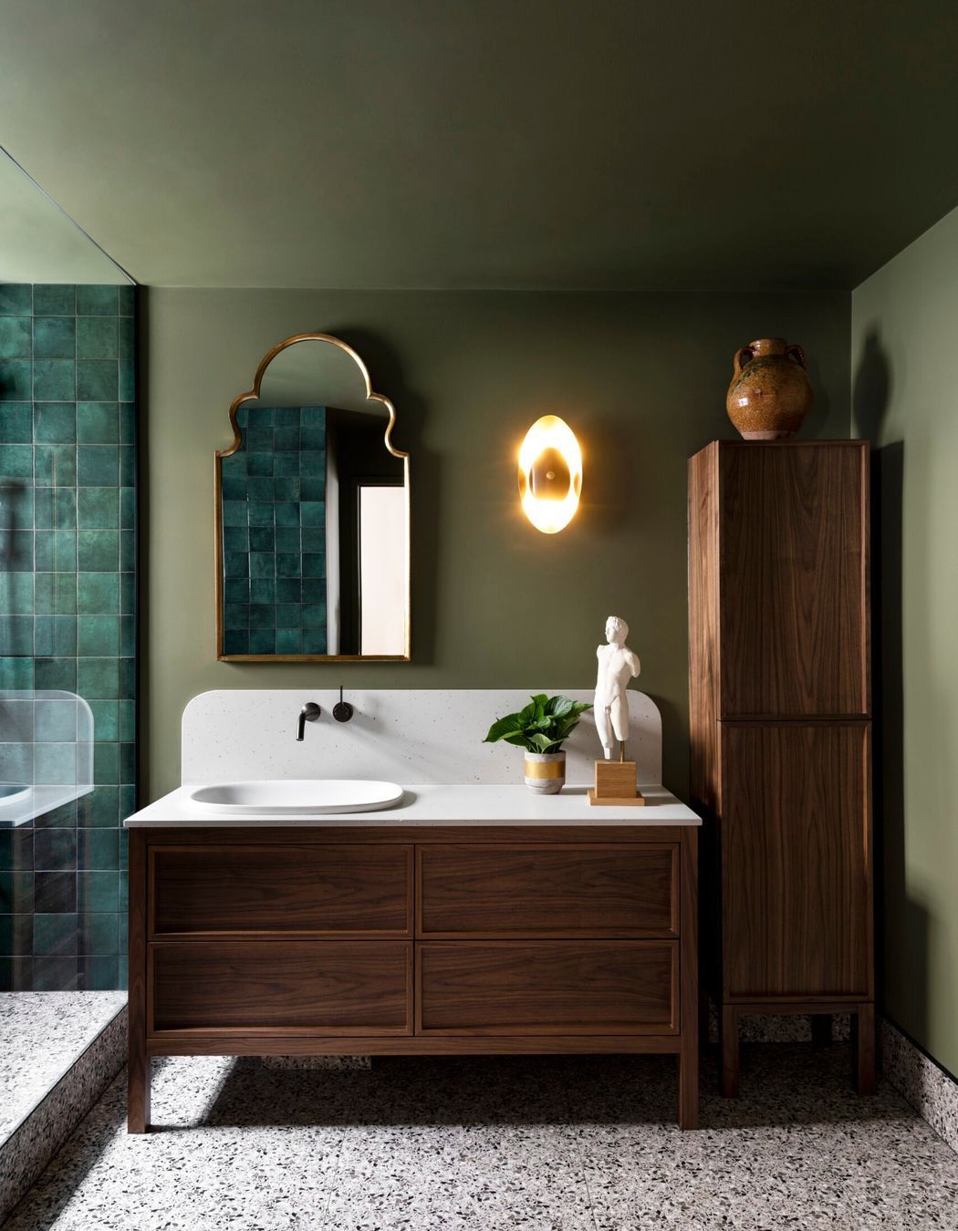 The right wall lights create a warm, welcoming atmosphere