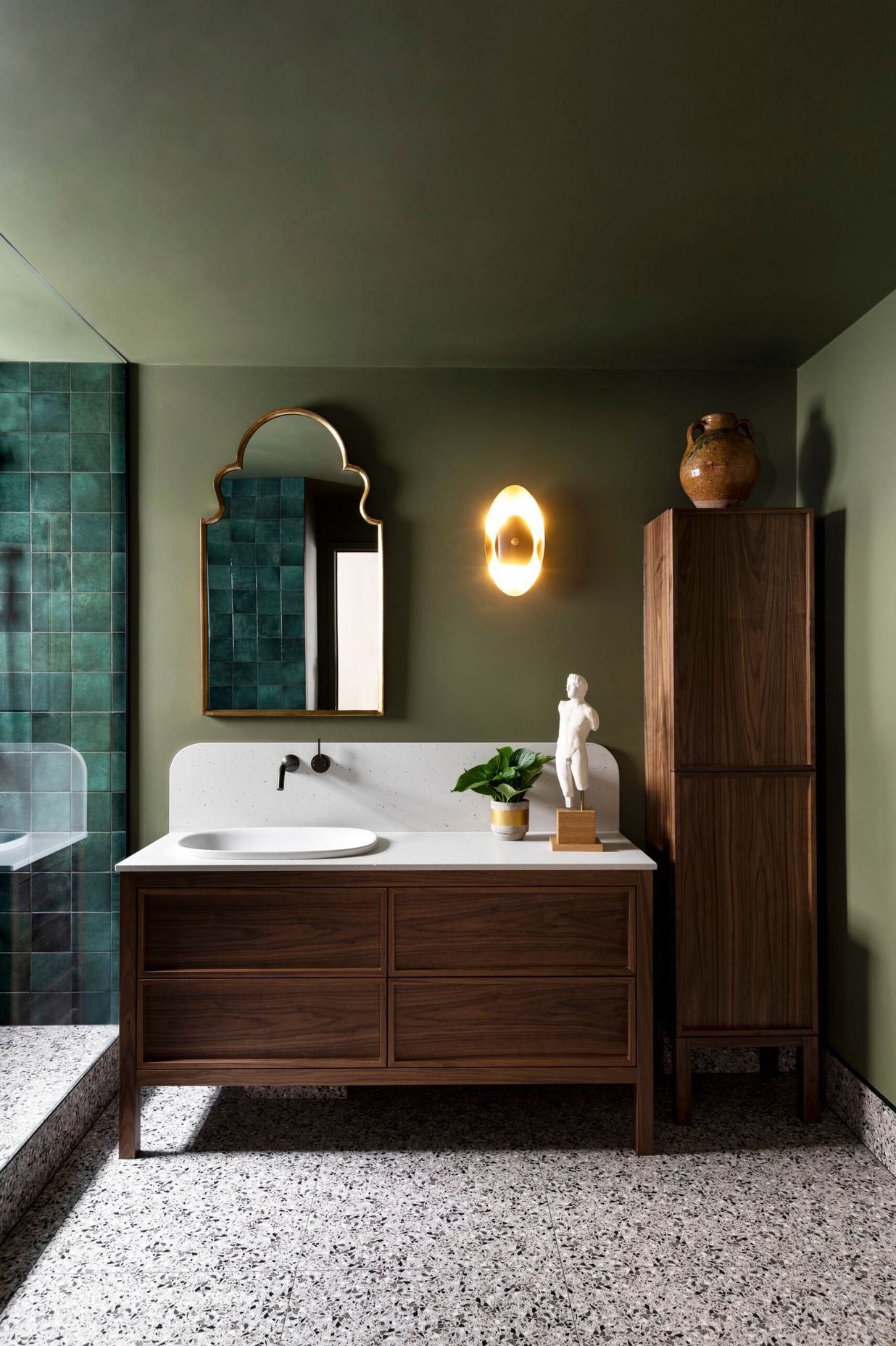 The right wall lights create a warm, welcoming atmosphere