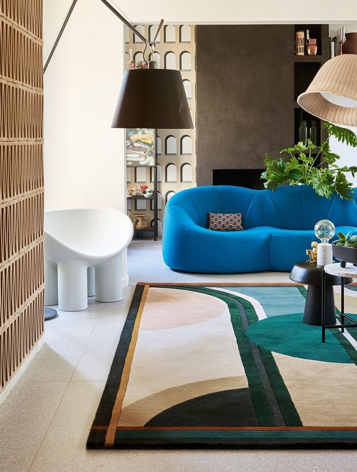The Sonia Rug by top3 by design features a stunning multi-color palette that effortlessly brings the room together