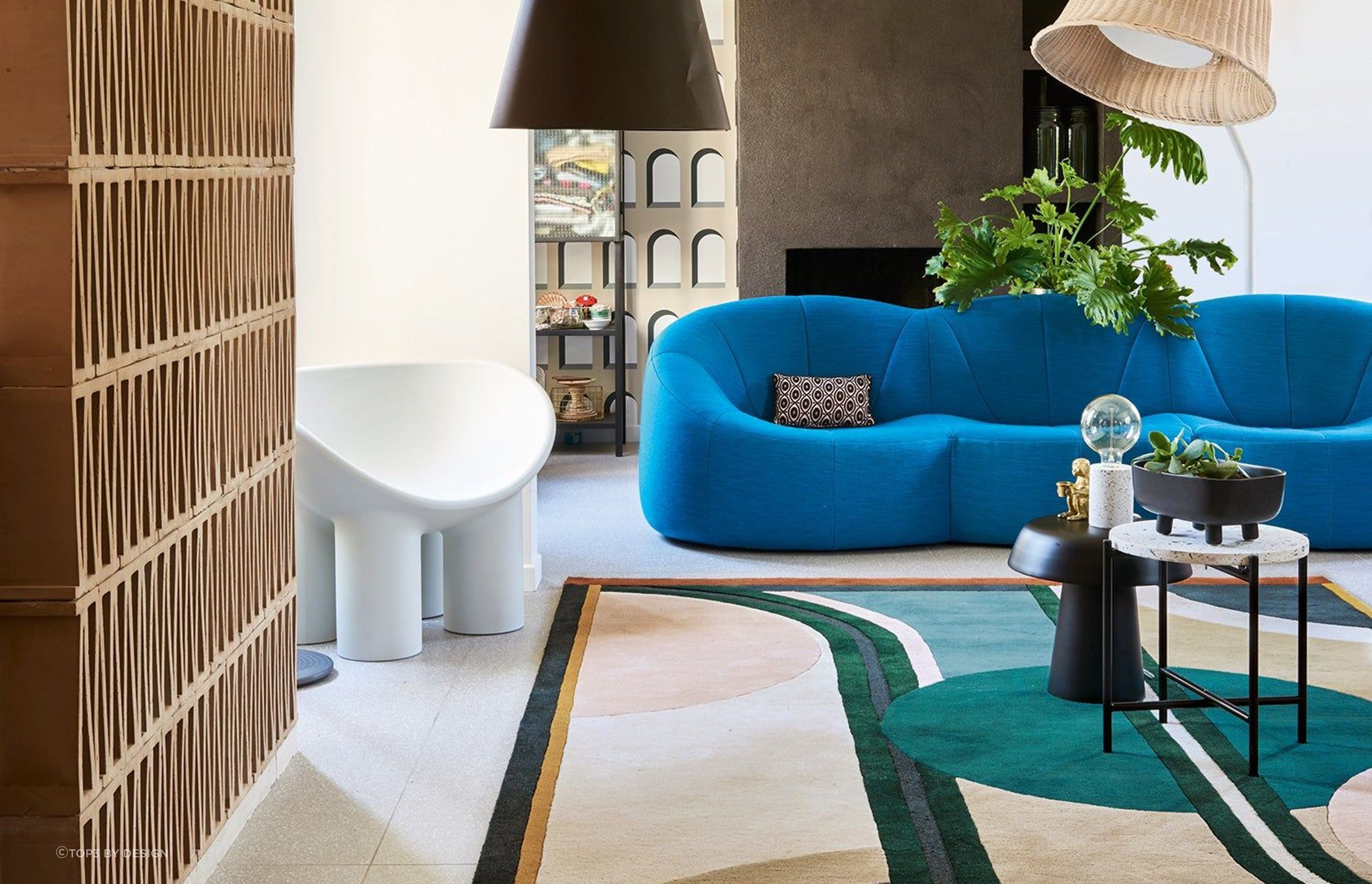 The Sonia Rug by top3 by design features a stunning multi-color palette that effortlessly brings the room together