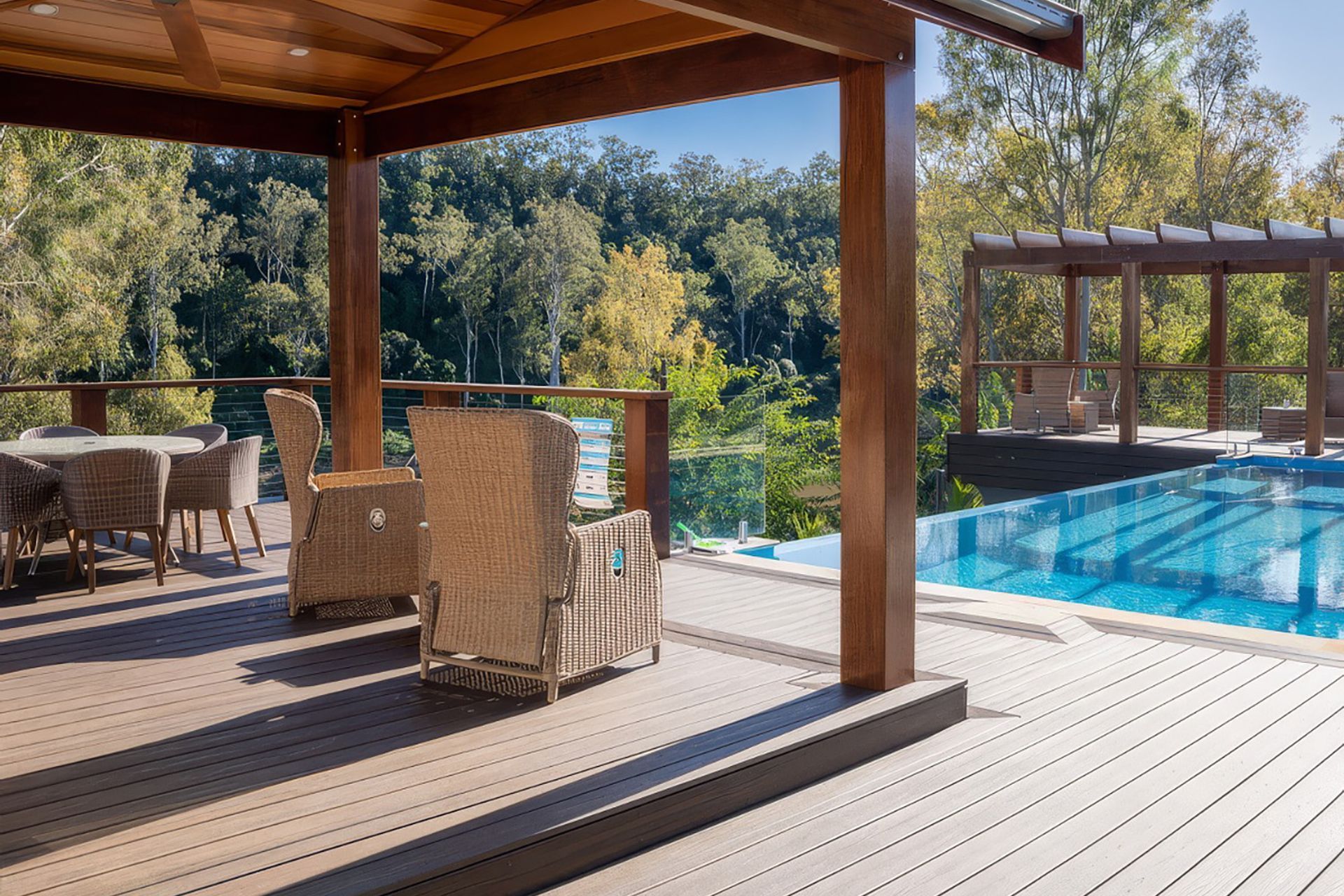 Incorporating a swimming pool into your design results in luxurious living, especially when complemented by a quality product like Trex® Decking By Hurford's.