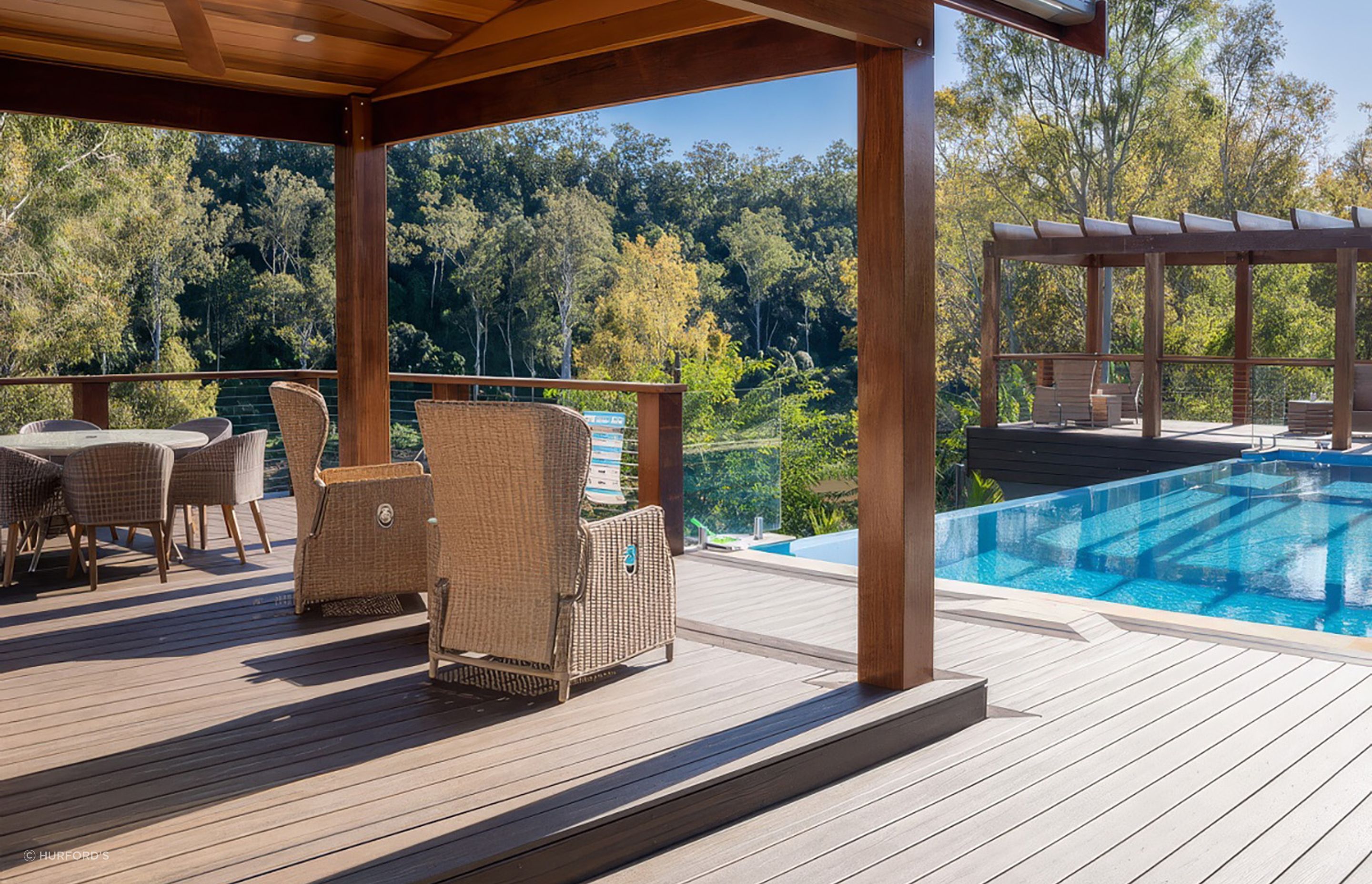 Incorporating a swimming pool into your design results in luxurious living, especially when complemented by a quality product like Trex® Decking By Hurford's.