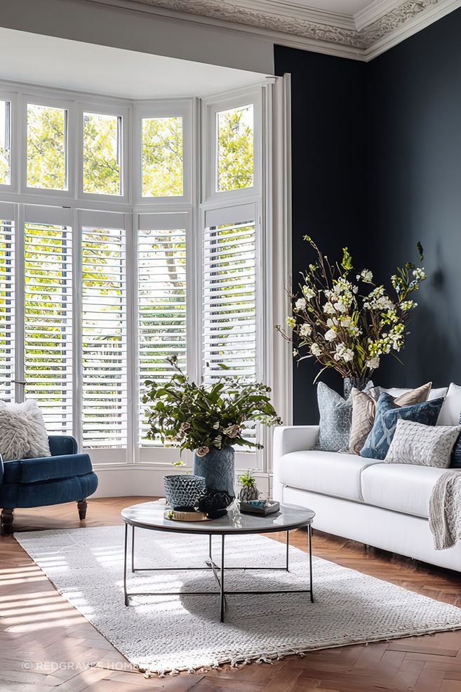 u4174536356Modernloungewithfull-heightwhiteshutterslig28253daa-de5b-4353-ad99-d83a2e68303601.jpeg