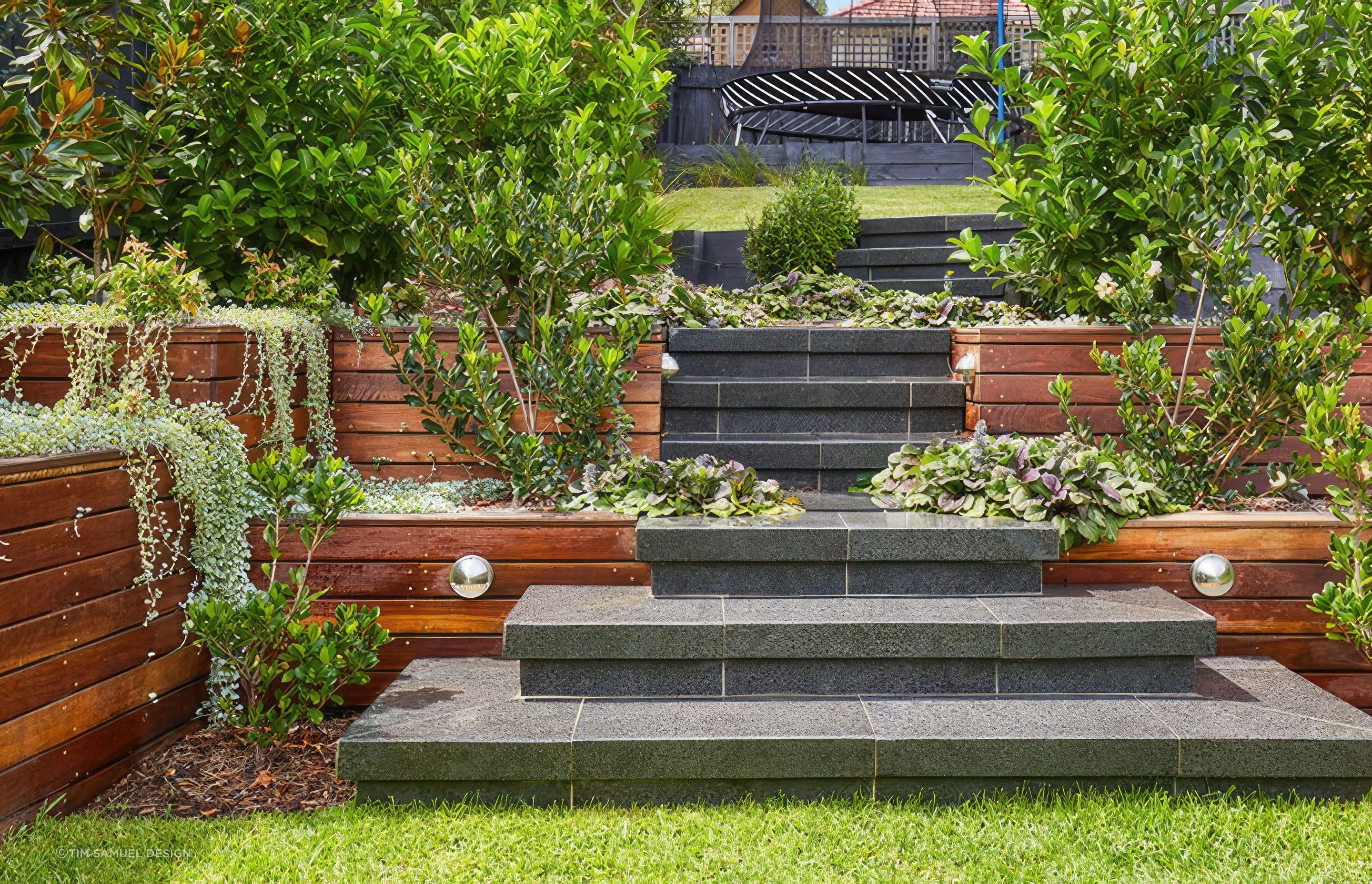 Johnston Crescent Project: Granite stairs connecting the lawn to the kids’ play area.