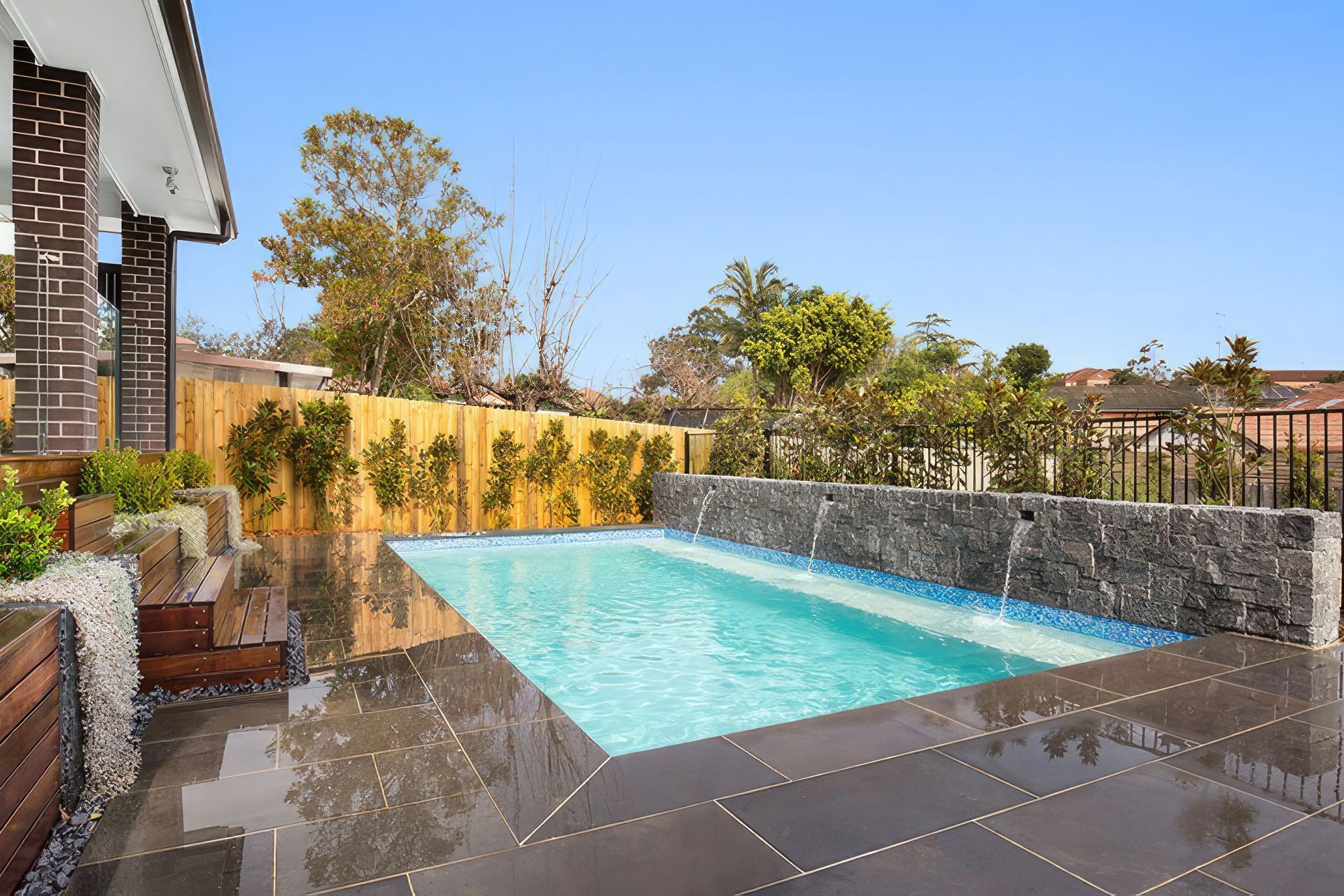 North Road Project: Spotted gum decking stairs which double as pool side bench seats.