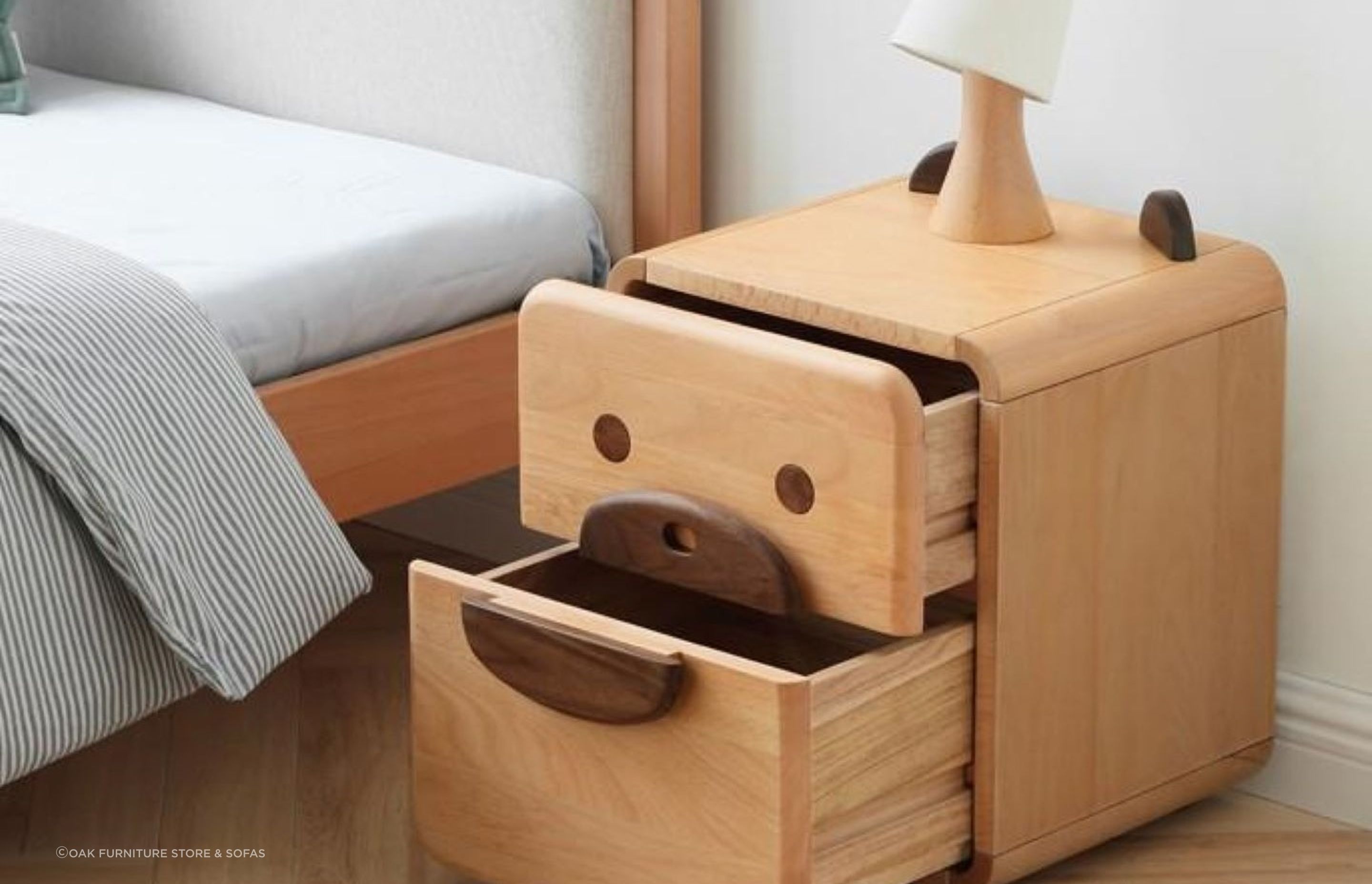 Kid's bedside tables can be playful and fun like the Urban Kidz Animal Oak Bedside Table.