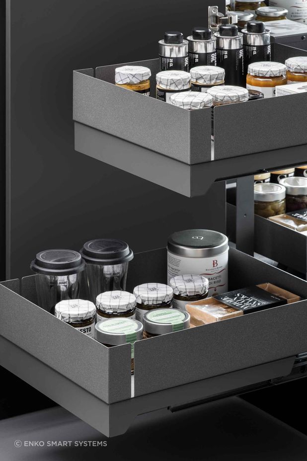 "the Fly Box kitchen corner mechanism is characterised by two independent shelves that extend right out to make the most of the space and have everything always at hand. All it takes is a single gesture and the return is cushioned to ensure smooth and silent operation."