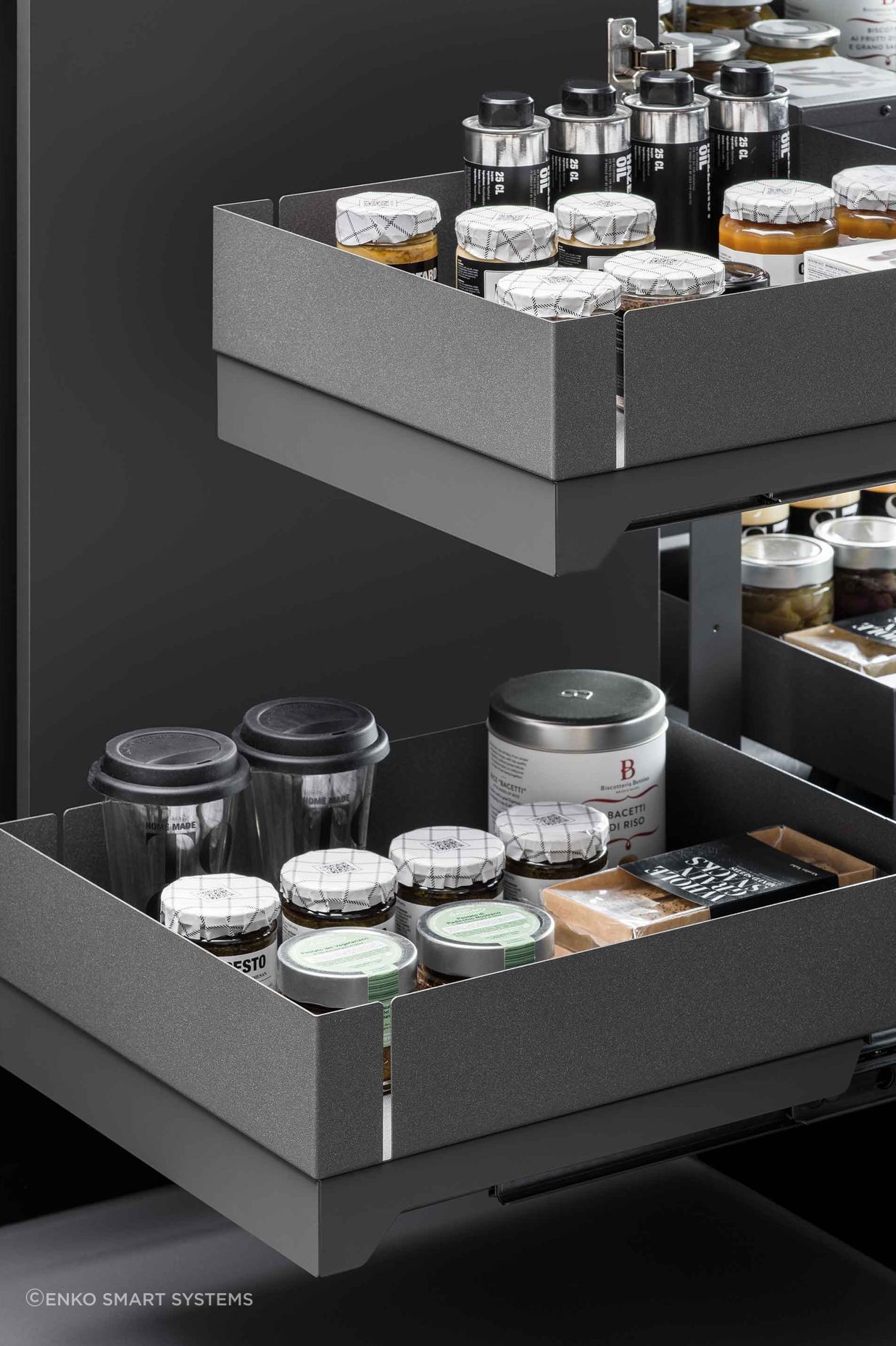"the Fly Box kitchen corner mechanism is characterised by two independent shelves that extend right out to make the most of the space and have everything always at hand. All it takes is a single gesture and the return is cushioned to ensure smooth and silent operation."