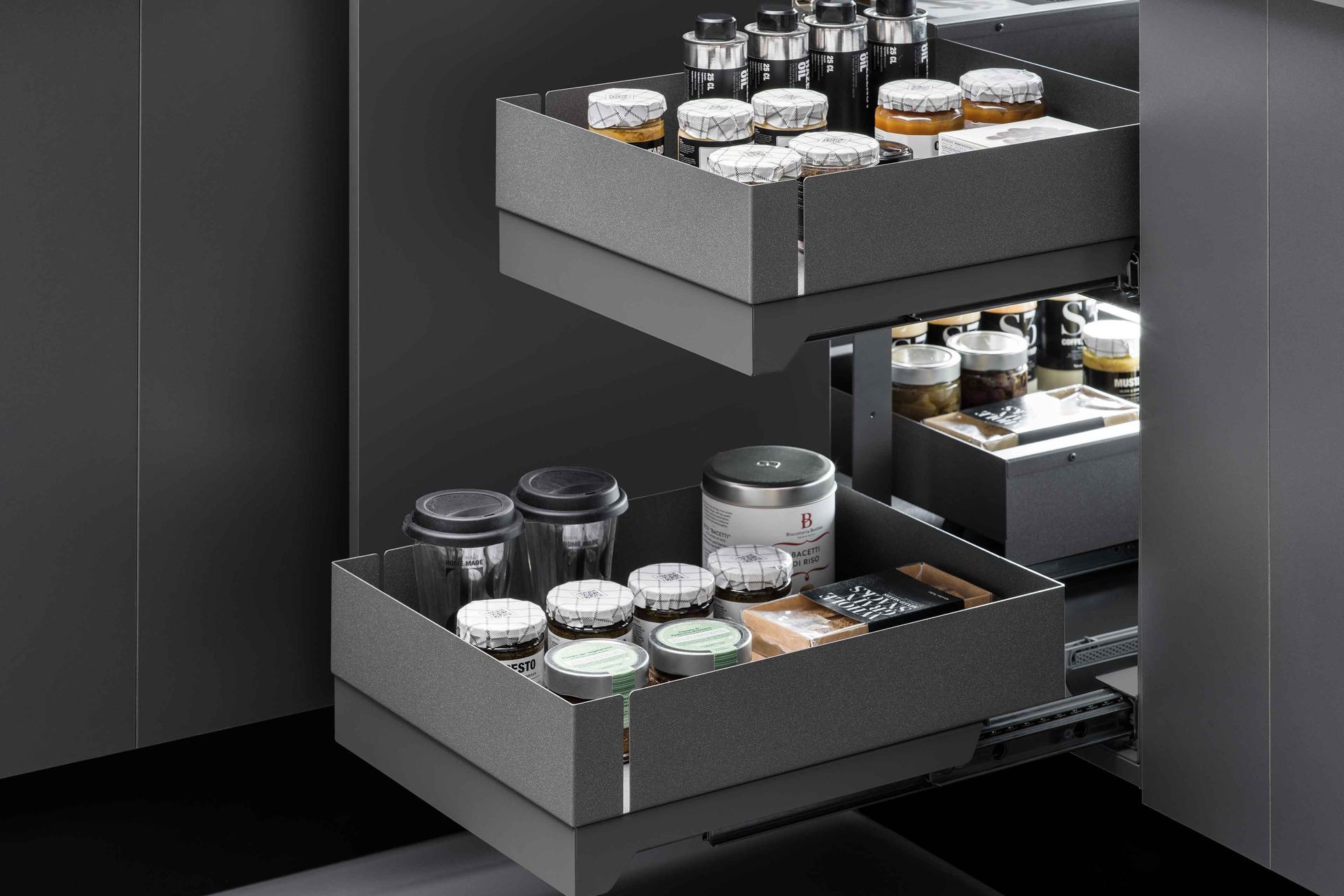 "the Fly Box kitchen corner mechanism is characterised by two independent shelves that extend right out to make the most of the space and have everything always at hand. All it takes is a single gesture and the return is cushioned to ensure smooth and silent operation."