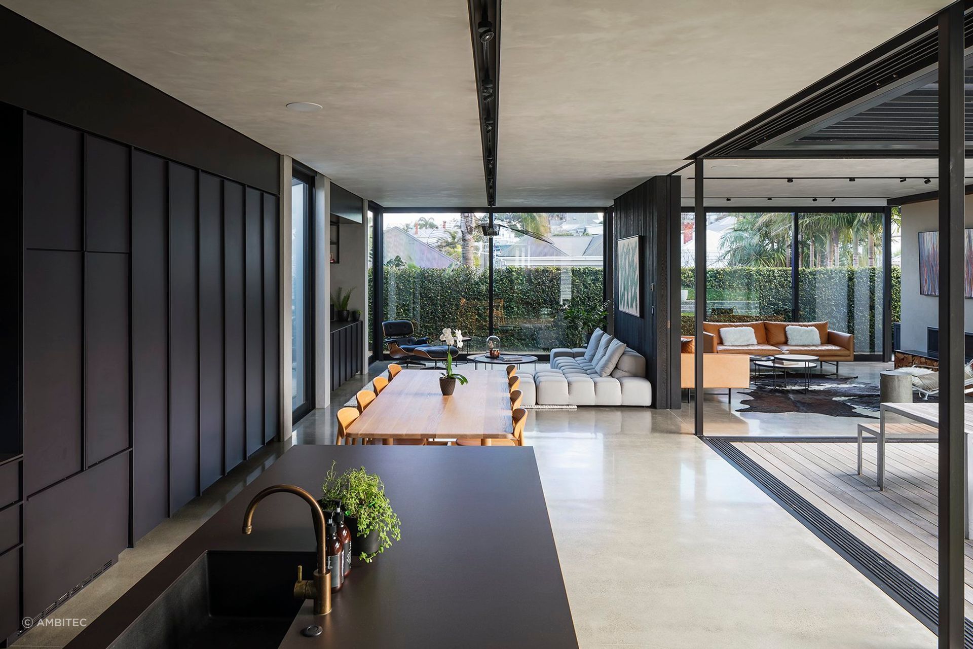 Suave two-tone in Tilt Slab Dark and Tilt Slab Light  creates a concrete effect on the ceiling at this Villa Extension.