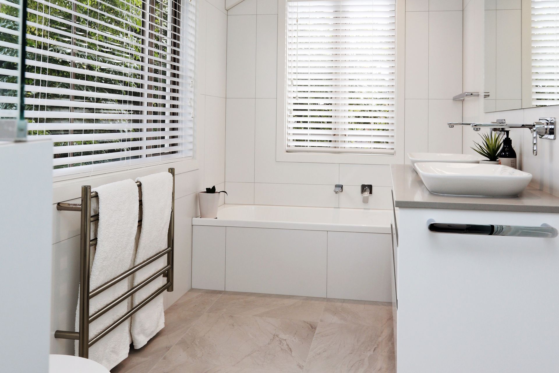 Elite Bathroomware manufactures a range of heated towel rails in a range of sizes and finishes to suit a variety of bathroom styles.