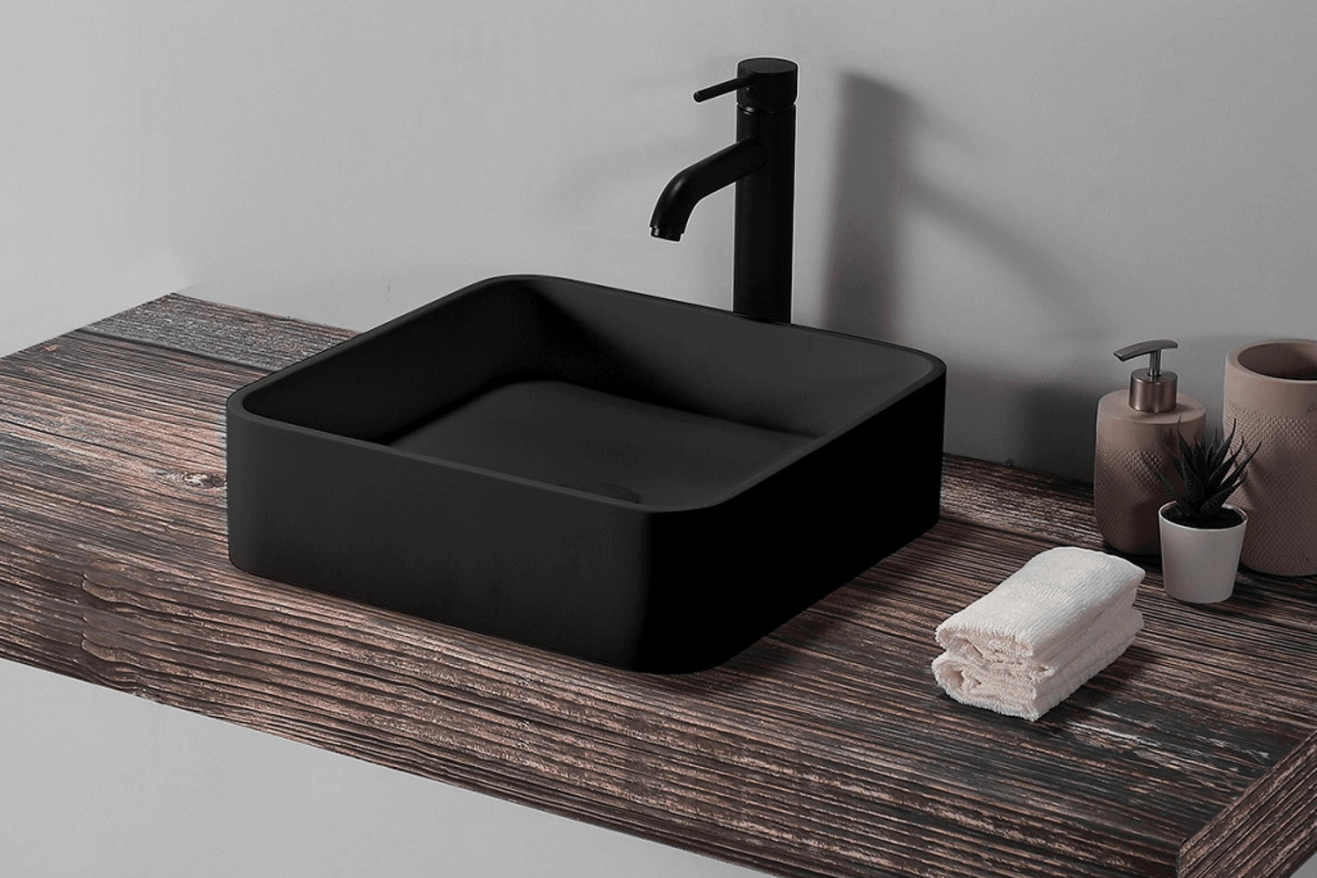 The beautiful B1700 Square Basin from Stonebaths the woooden panel adds a touch of natural beauty to the space