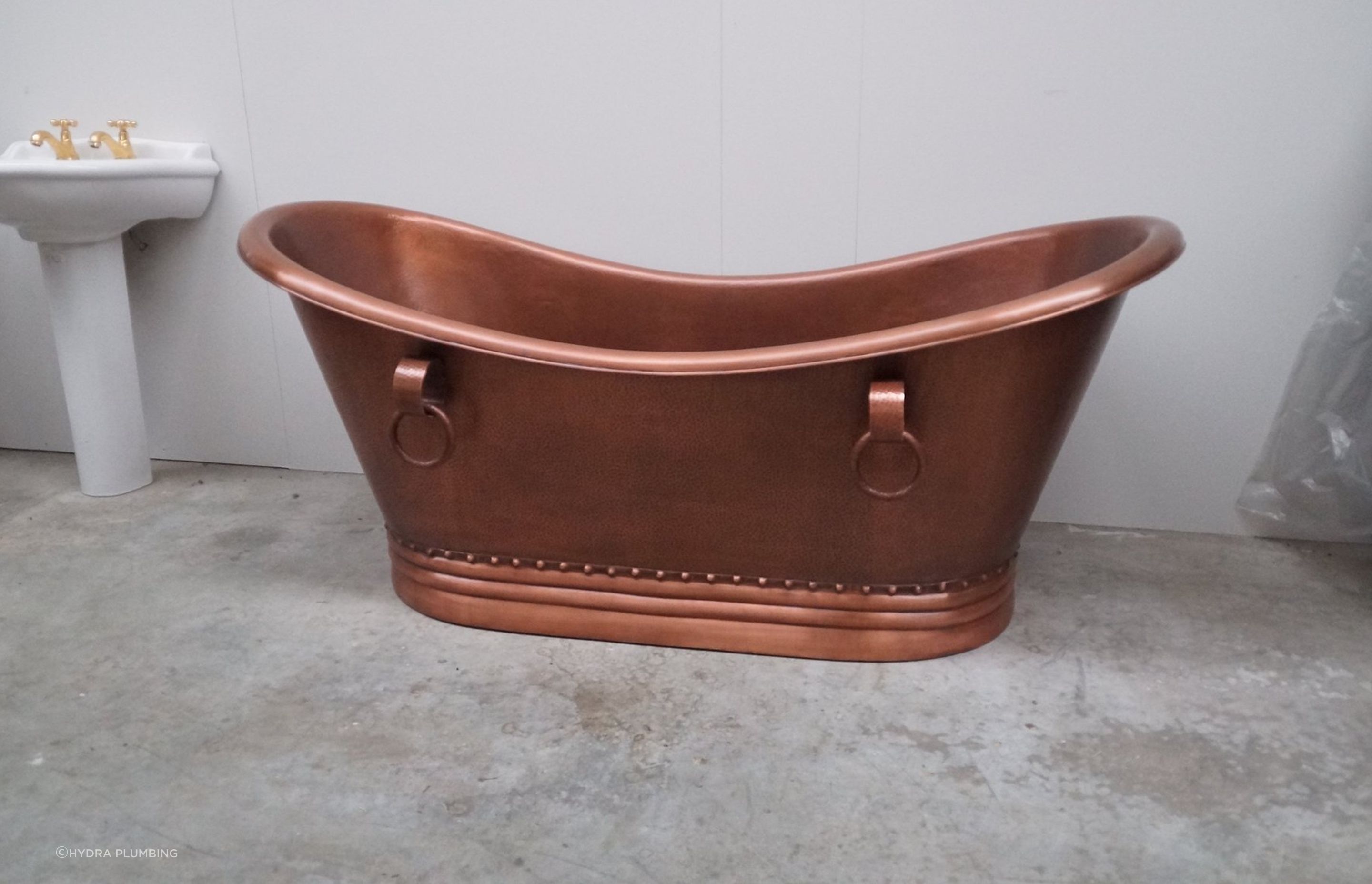 This hammered copper bathtub has unique rustic charm.