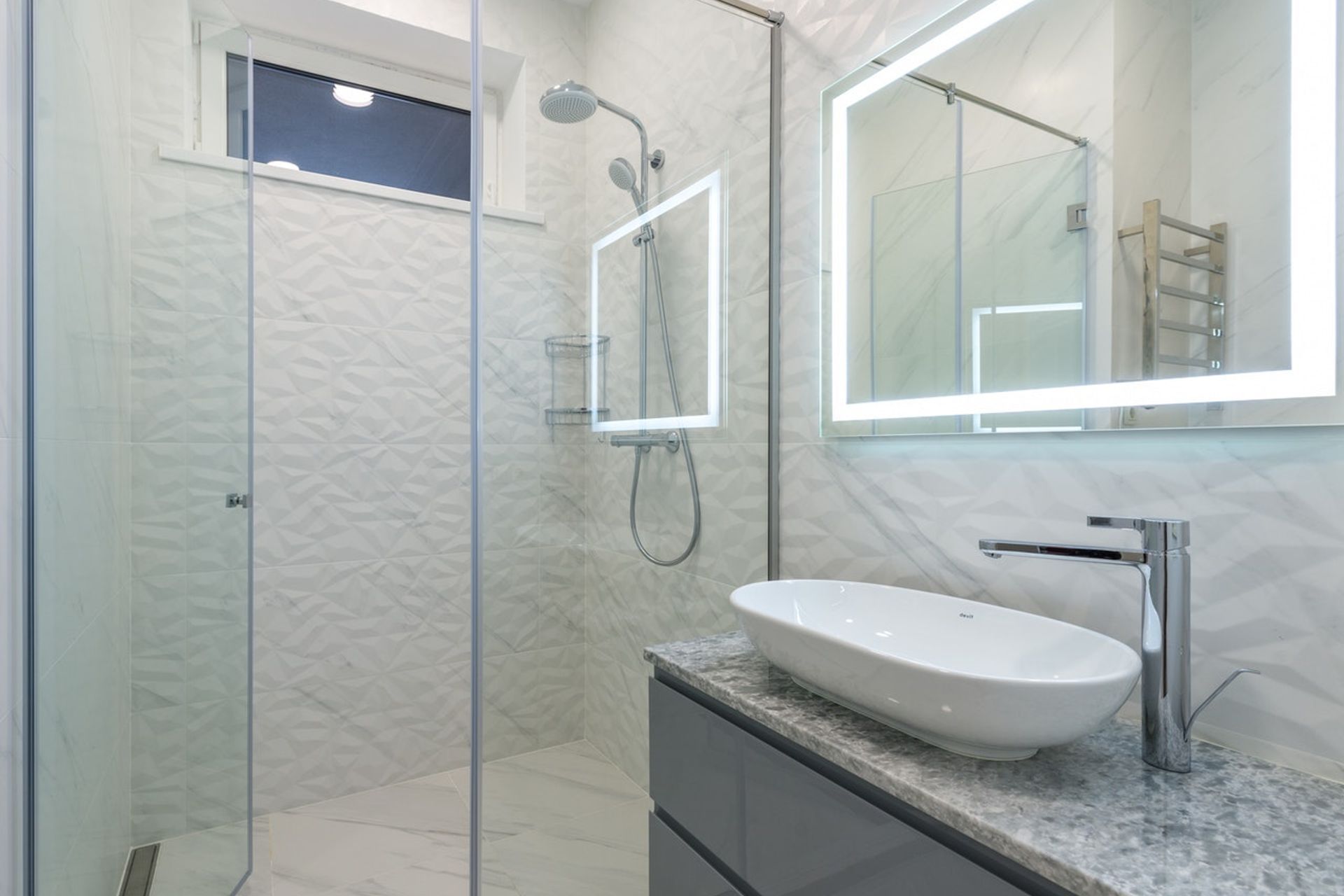 By using glass doors, your shower can act as as an extension of the bathroom space.