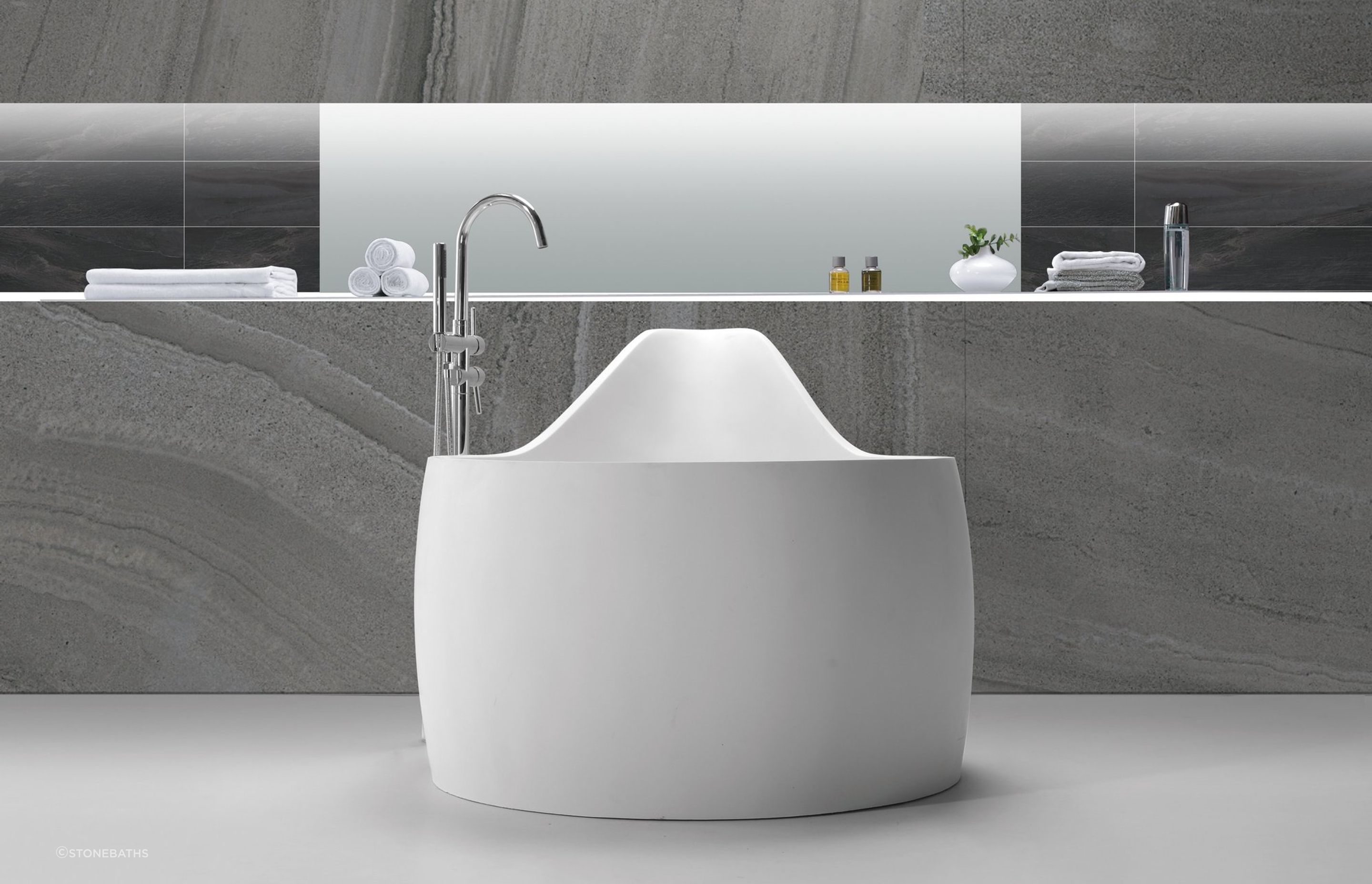 The unique and stylish B070 Large Hugi Soak Tub from Stonebaths