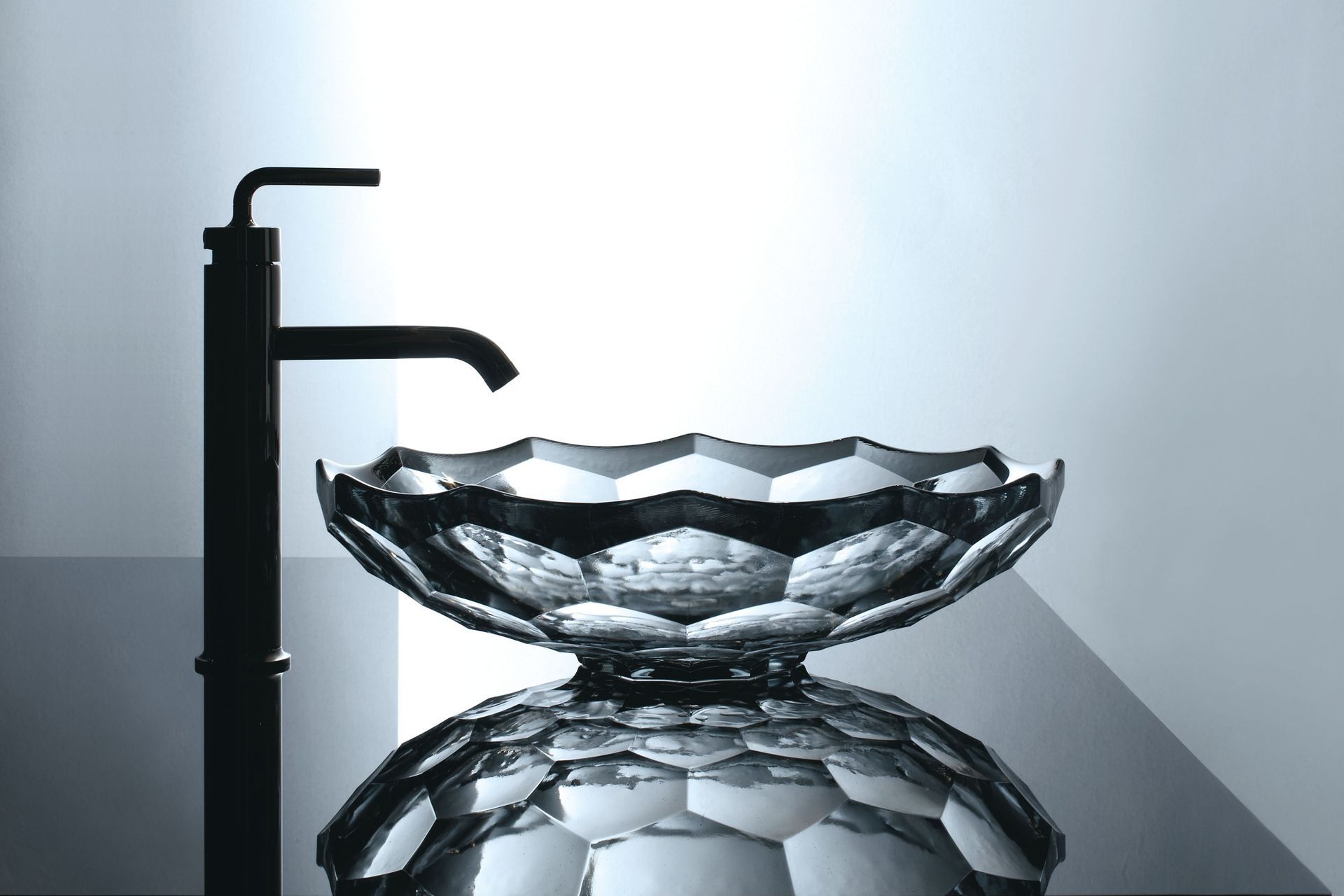 Glass sinks are unique, elegant, easy to clean and do not retain stains.