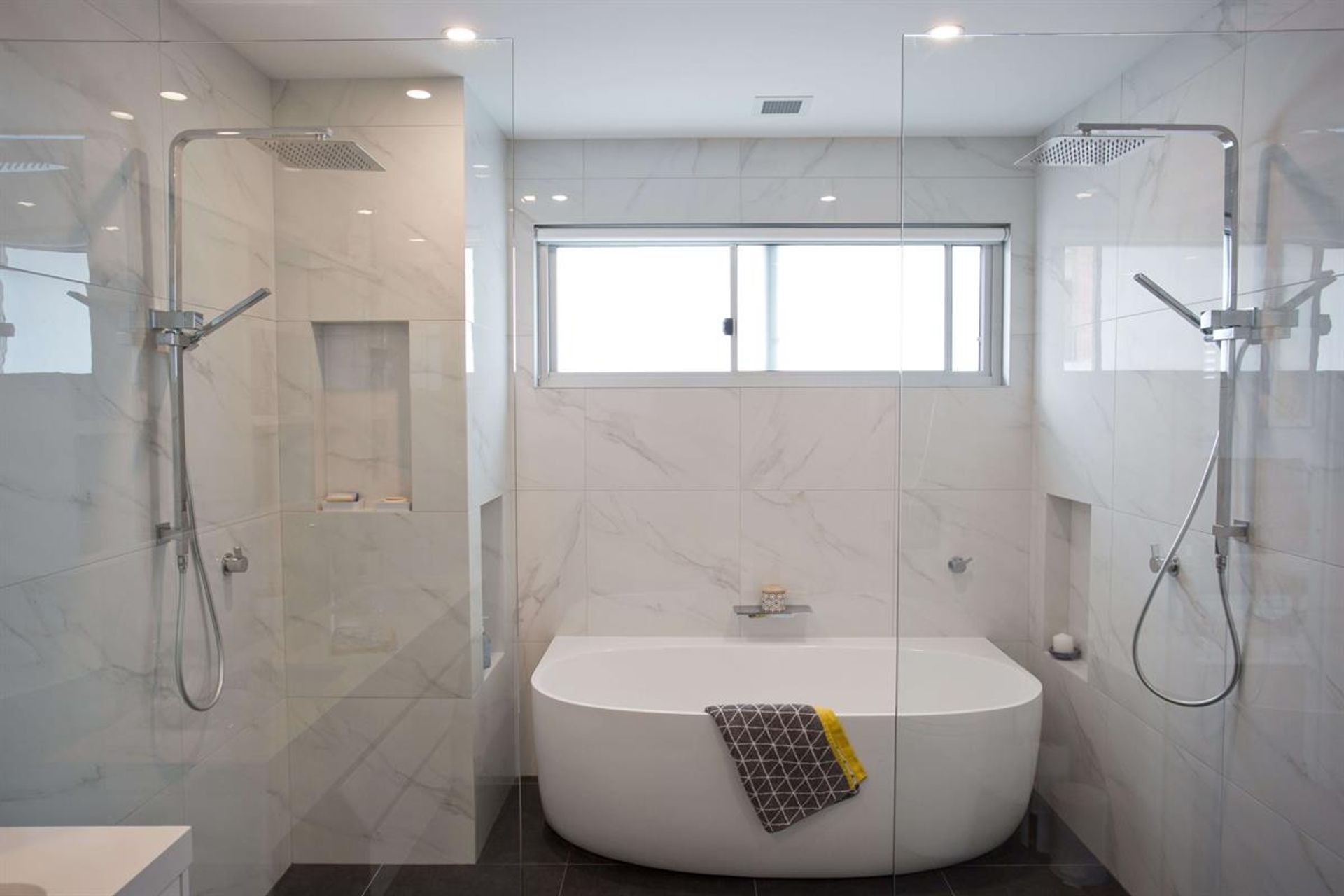 Glass shower screens feature at a first floor addition at Dee Why - Photography: Lachlan Carey