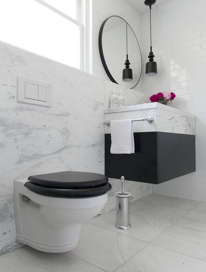 A space-saving Perrin & Rowe Wall Hung Toilet Pan