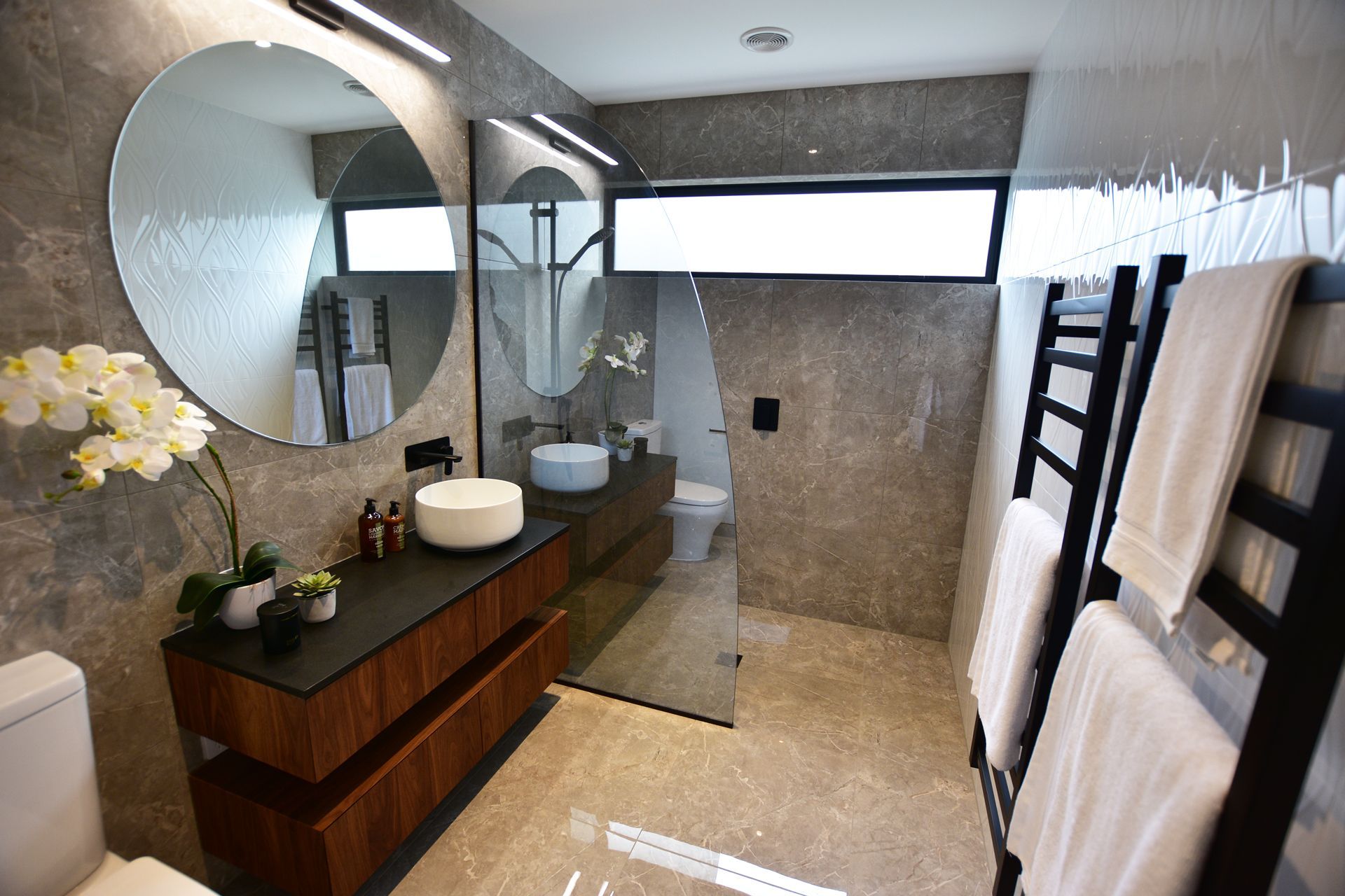 Create a bathroom as individual as you are with elements including custom shower screens, Eclipse LED mirrors and quality hardware designed to match your bathroom fixtures and fittings.