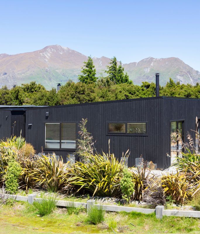 A jet-black mountain home protected by CUTEK