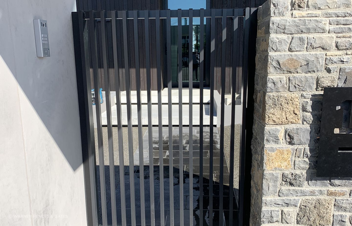 All of the joinery in the fencing and gate is powder coated in Colorsteel’s Flaxpod Matt.