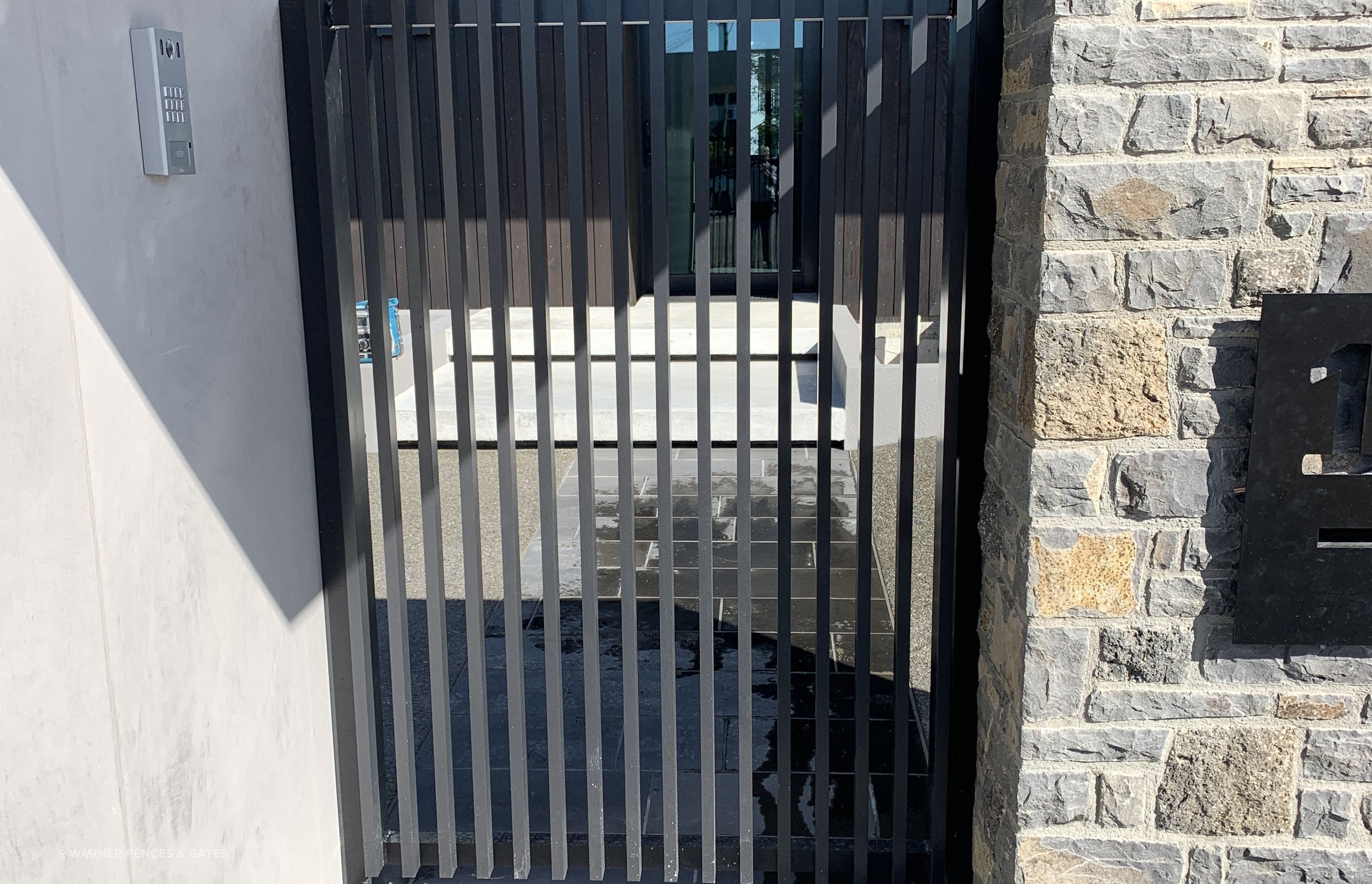 All of the joinery in the fencing and gate is powder coated in Colorsteel’s Flaxpod Matt.