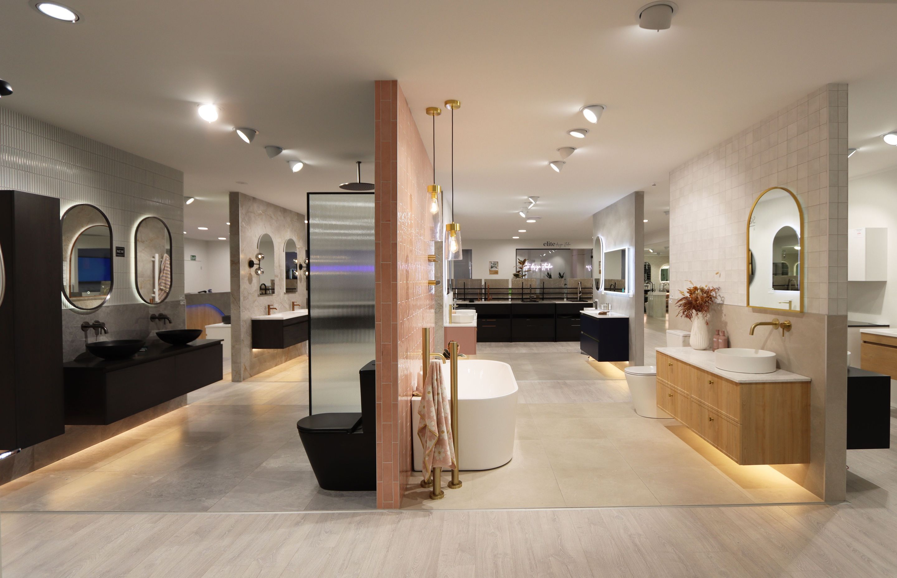 Elite Bathroomware's showroom with the new design studio in the background.