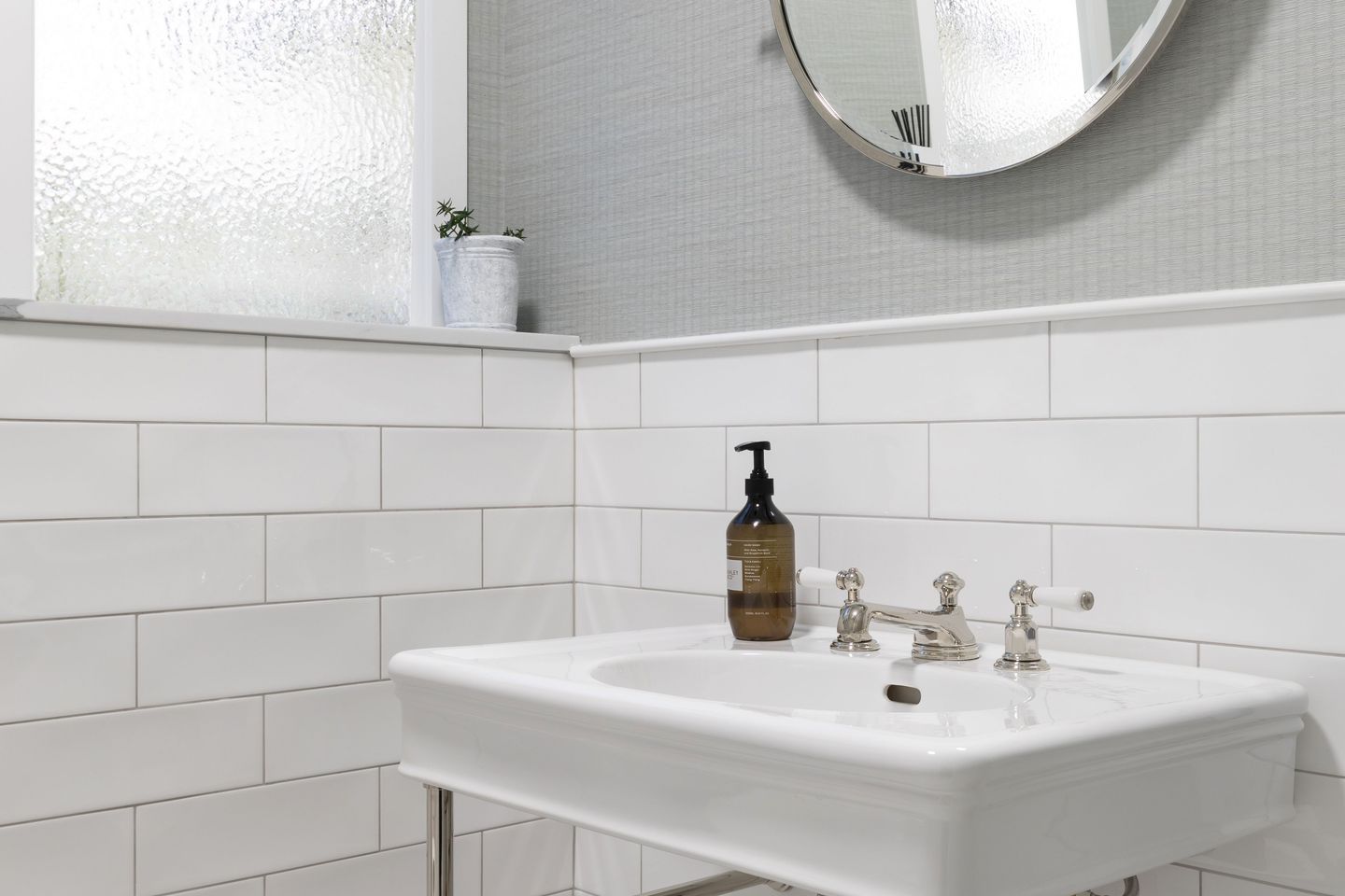 The circular option juxtaposes nicely against linear elements in the bathroom.