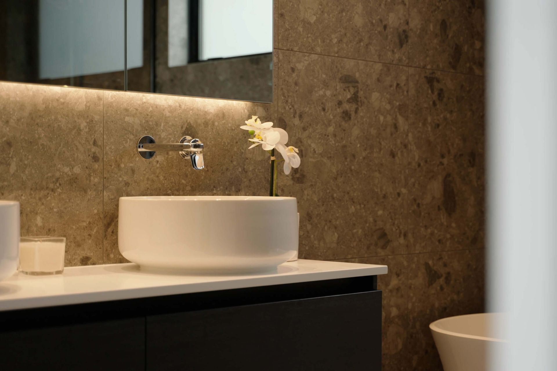 The new ensuite is contemporary to suit the new home.