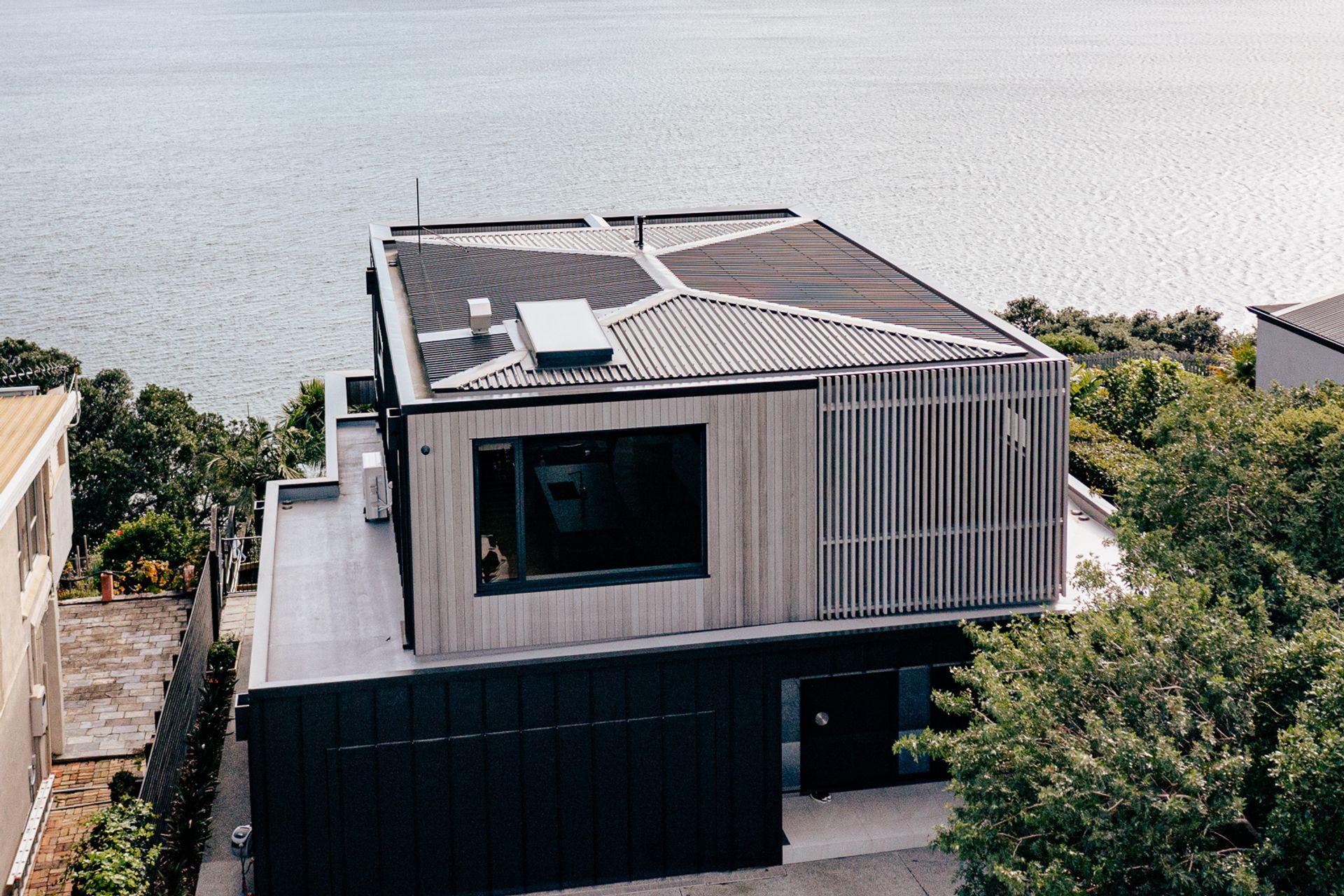 The site has commanding views of the bays on the Whangaparāoa Peninsula.