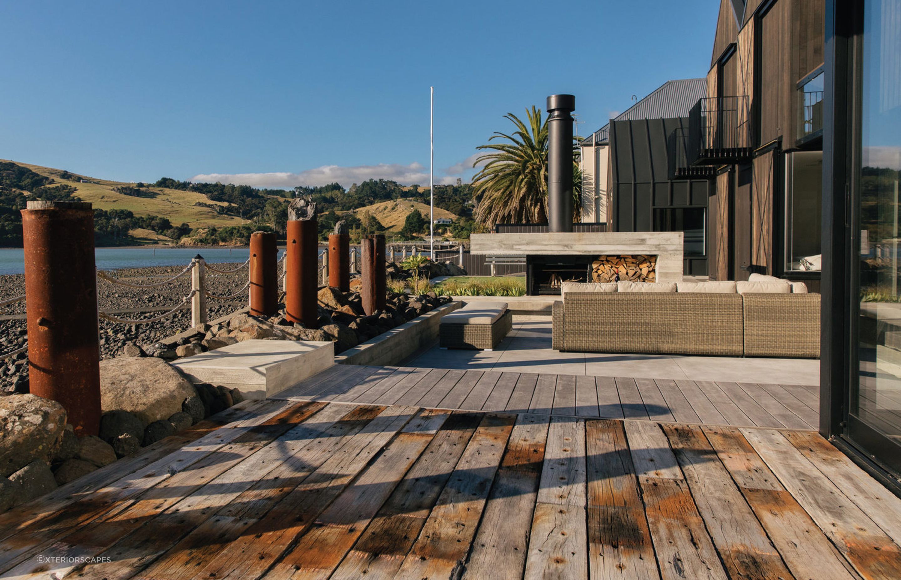 A sunken seating area, like this in this exquisite Akaroa residence, provides a cosy and intimate social space.