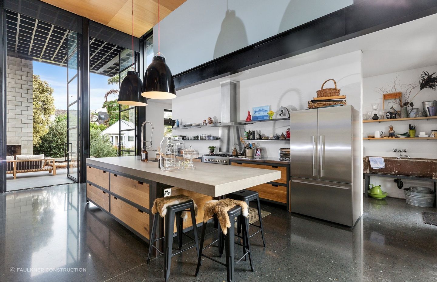 Vast open spaces, steel beams, robust furnishings and more help encapsulate the industrial style aesthetic in this superb home on Apihai Street in Orakei.