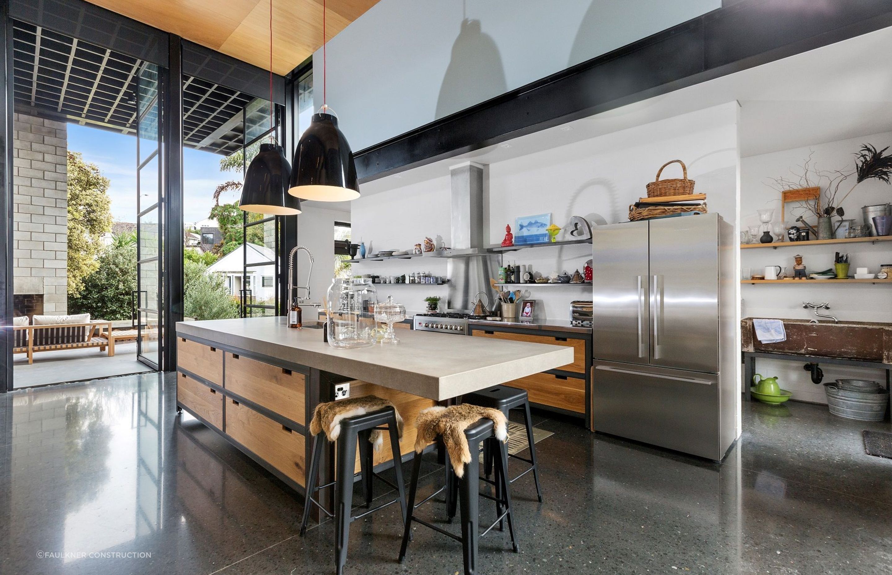 Vast open spaces, steel beams, robust furnishings and more help encapsulate the industrial style aesthetic in this superb home on Apihai Street in Orakei.