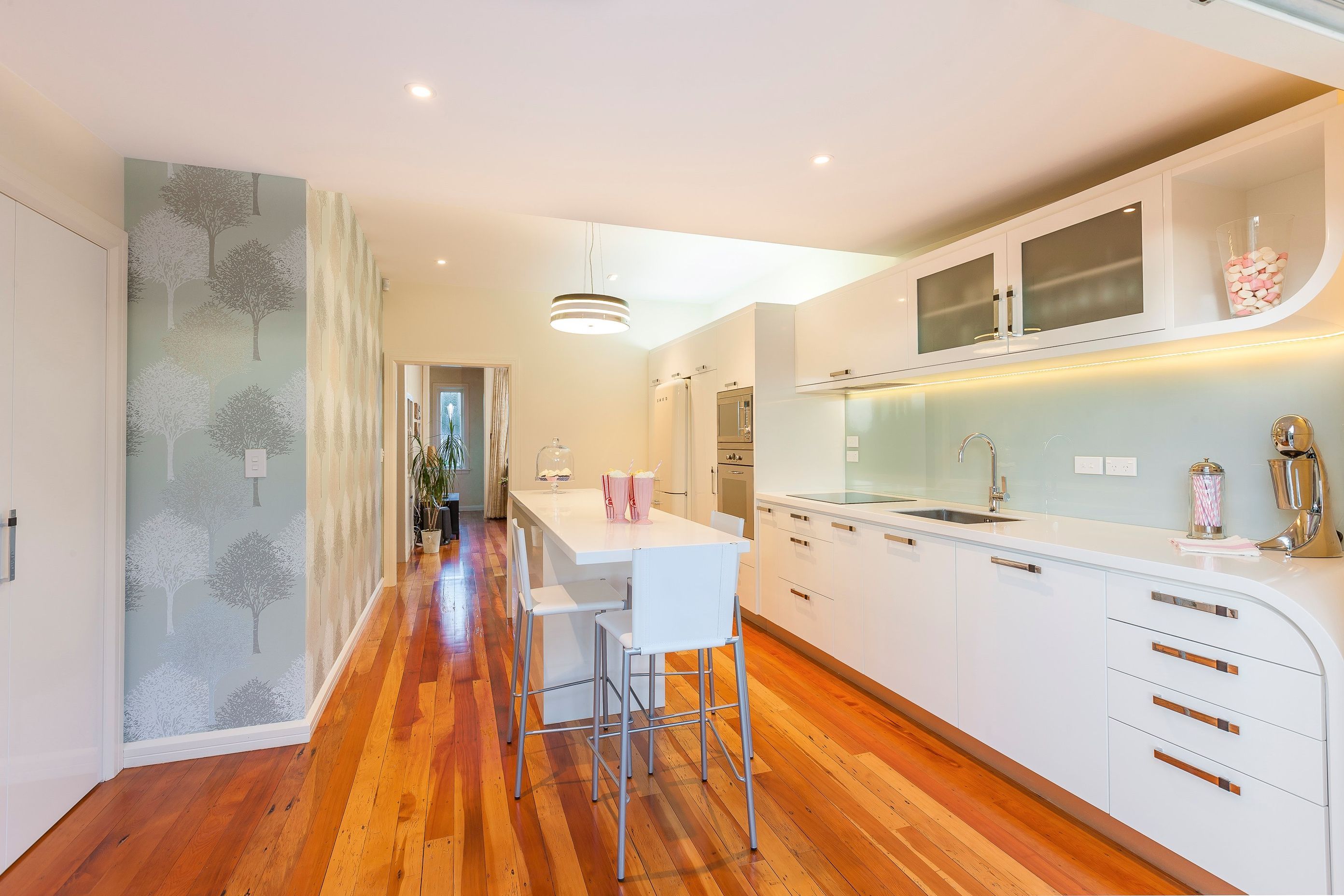 This Art Deco renovation in Mount Eden is wonderfully designed and furnished with some inclusions like light fittings and appliances that personify the era. | Photography: Kallan MacLeod