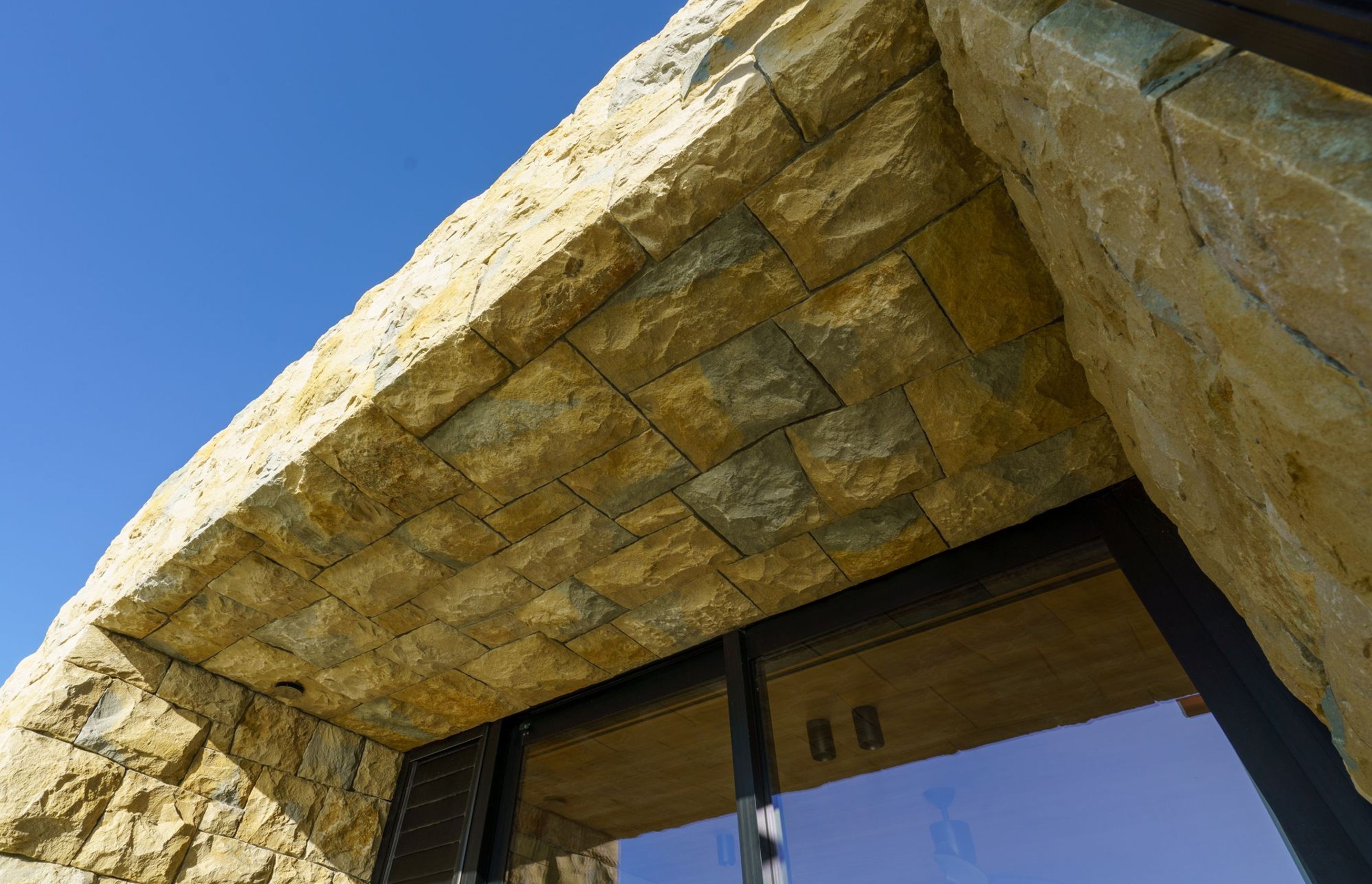 An example of a soffit at the Beachland home, which required a lot of precision from Len's team of stonemasons.