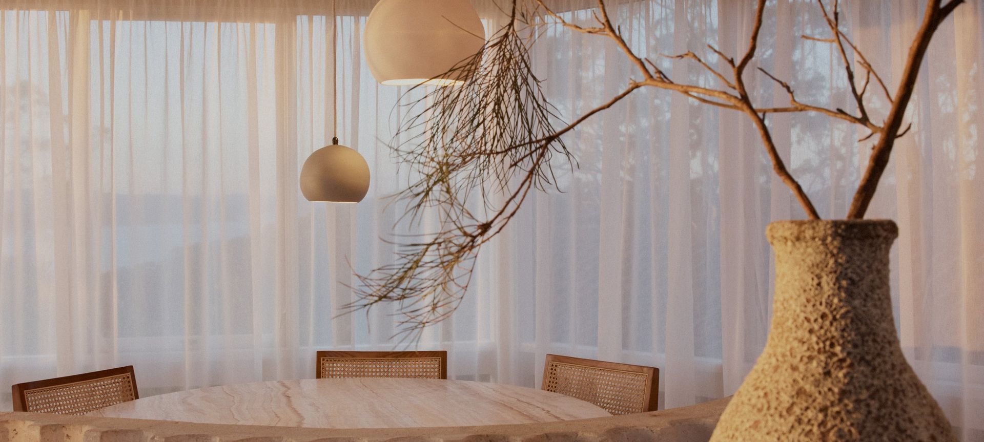 Plateau by RAMA Architects and Steedman Constructions featuring Studio Enti's Orb pendants.