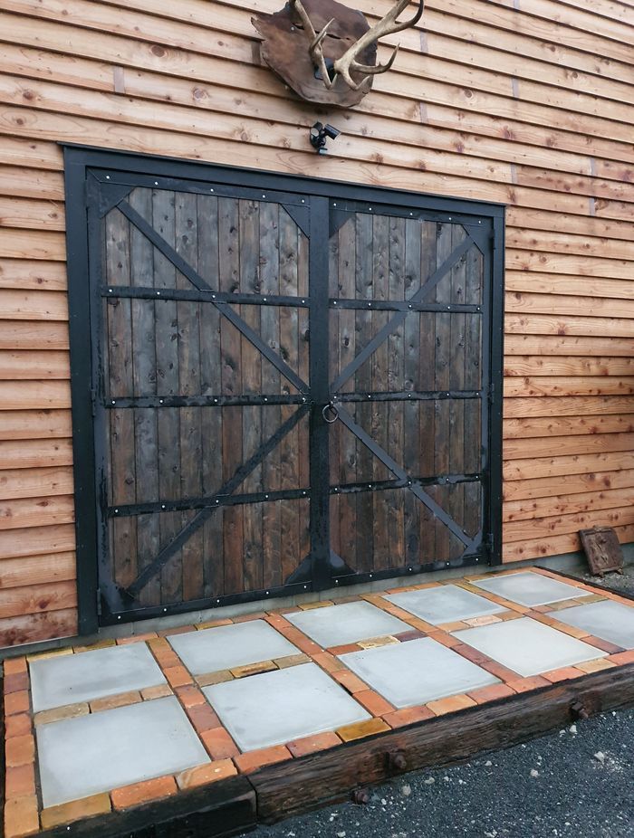 These double barn doors were designed and manufactured by QMD.