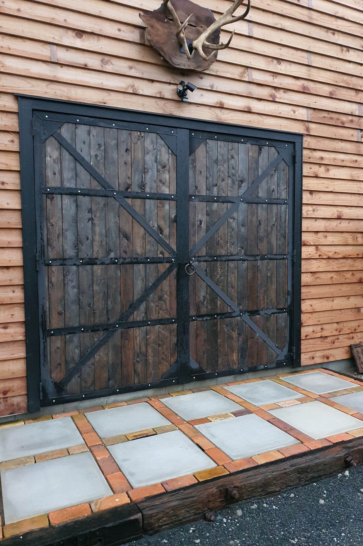 These double barn doors were designed and manufactured by QMD.
