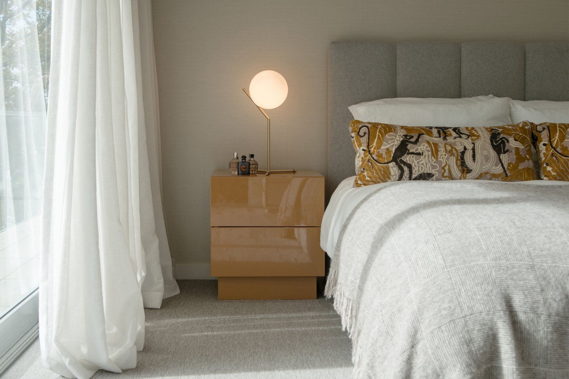 A stylish bedside table, like this featured here in the wonderfully furnished Benson House, provides convenient storage to help keep your bedroom clutter-free.