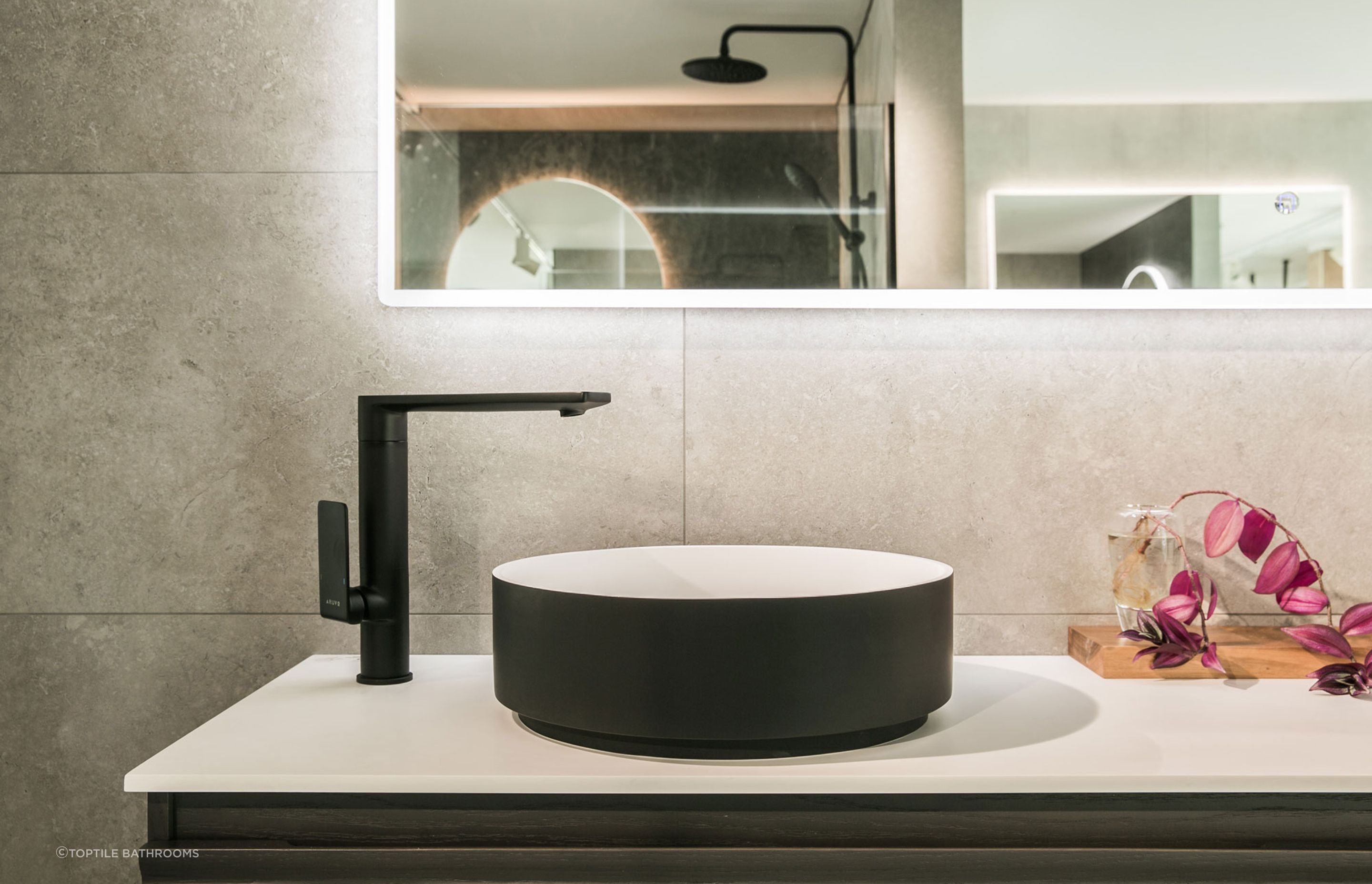 The classic and captivating contrast of black and white with the Lorna Composite Stone Countertop Basin.
