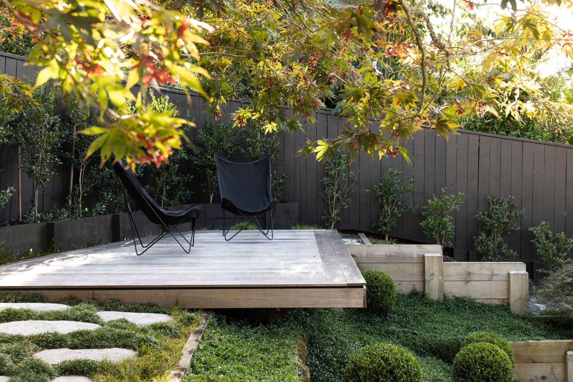 A secluded spot in a corner of a Japanese inspired garden in Crocus Place.