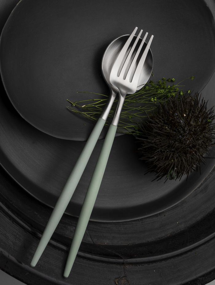 The Cutipol Goa cutlery sets (shown here in Celadon) feature sleek resin handles.